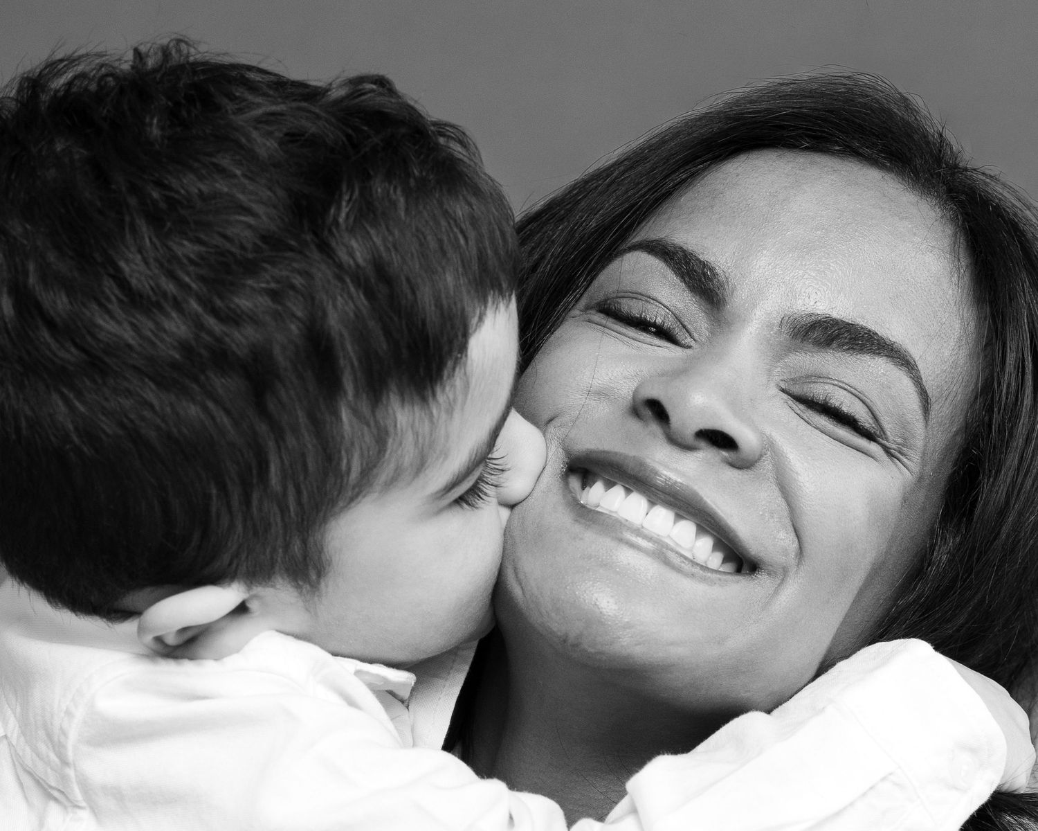 Candid portrait of a mother and son by a family photographer in Woodbridge, Connecticut