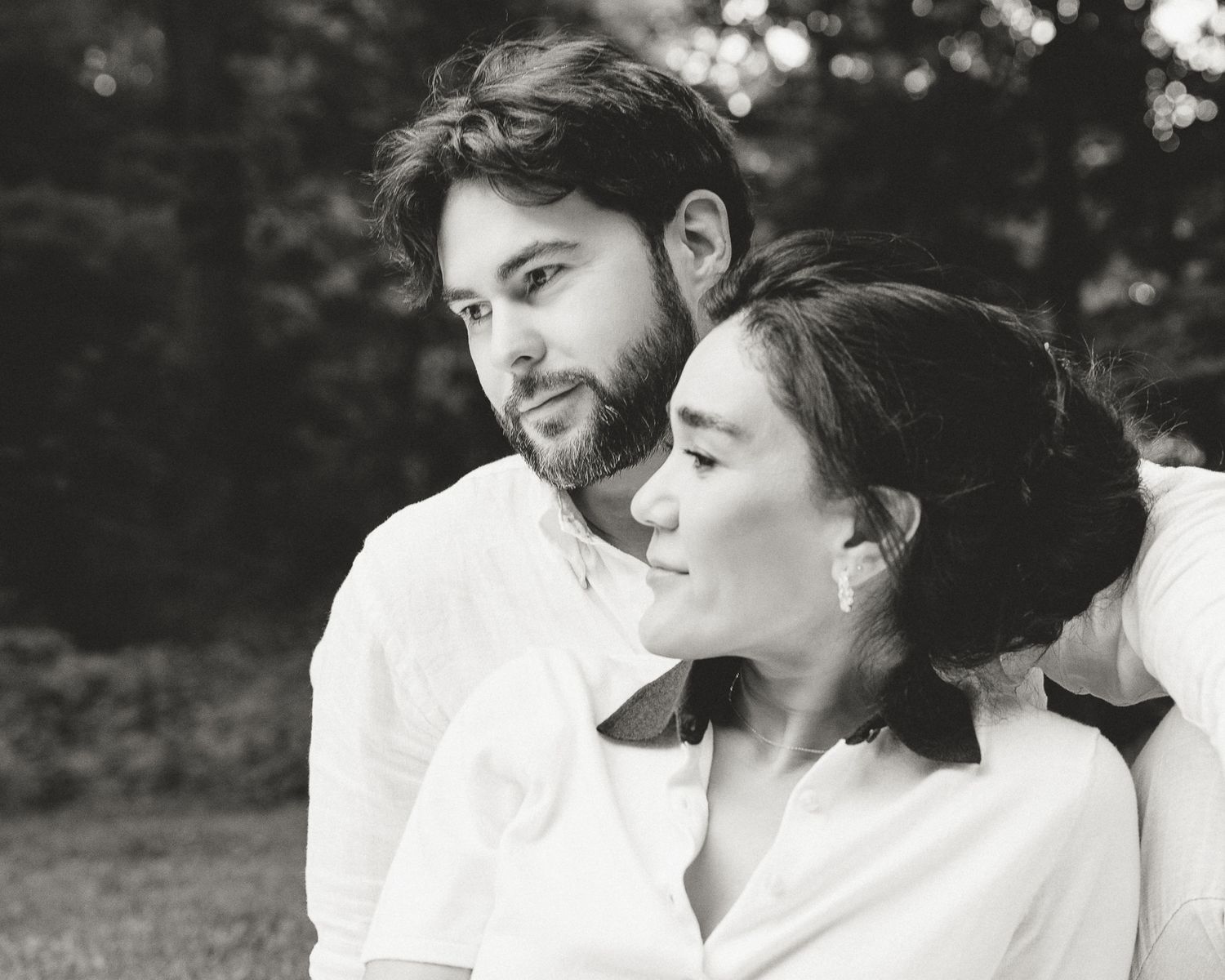 Black and white portrait of a couple embracing outdoors, Woodbridge, CT family photographer