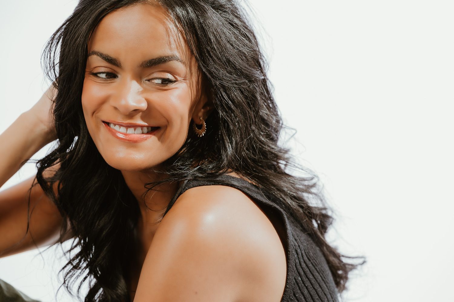 Portrait photographer Noemi Blumenthal smiling in her Woodbridge, Connecticut studio
