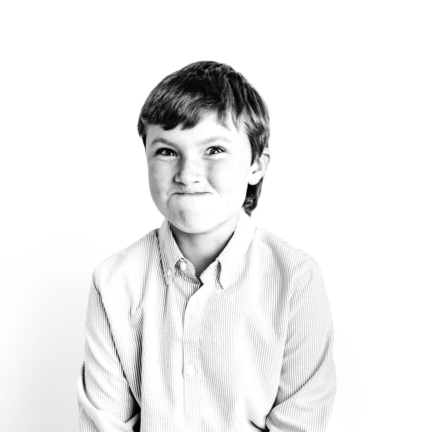 Black and white portrait series showing different facial expressions.