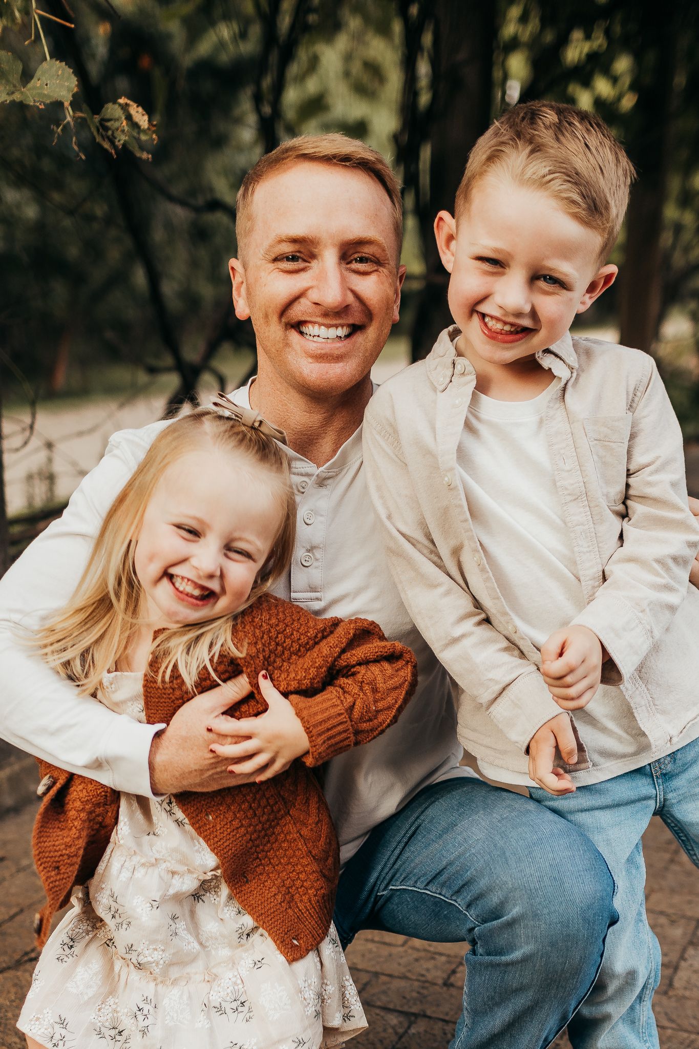 Candid family moments captured outdoors showing natural laughter and connection.