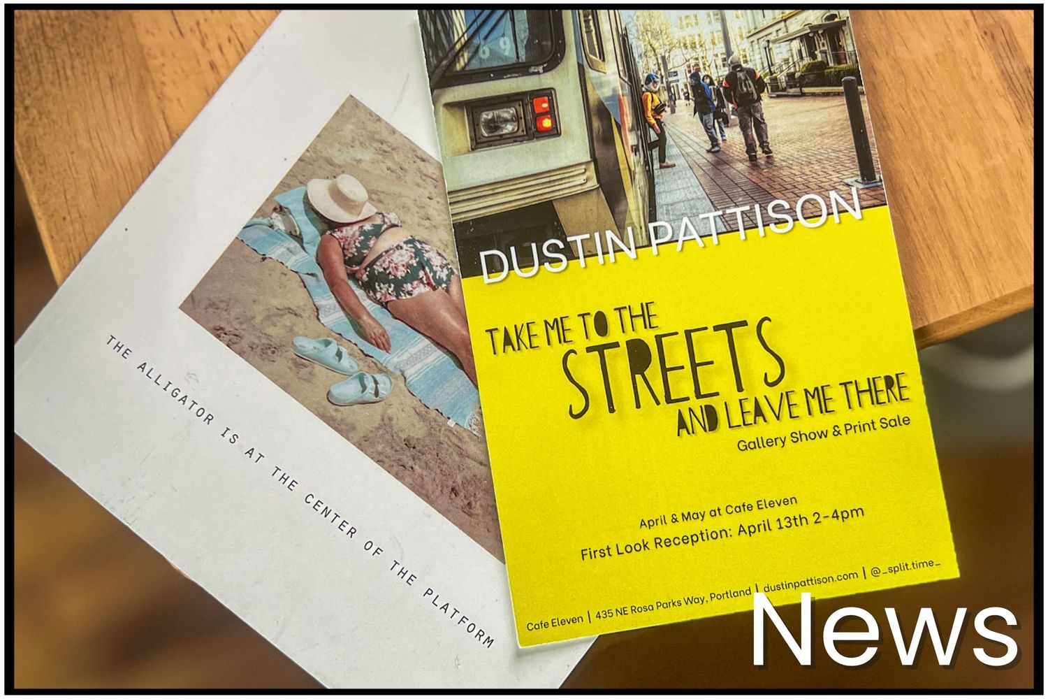 Books with yellow and white covers displayed on a wooden surface with text 'NEWS' visible in corner.