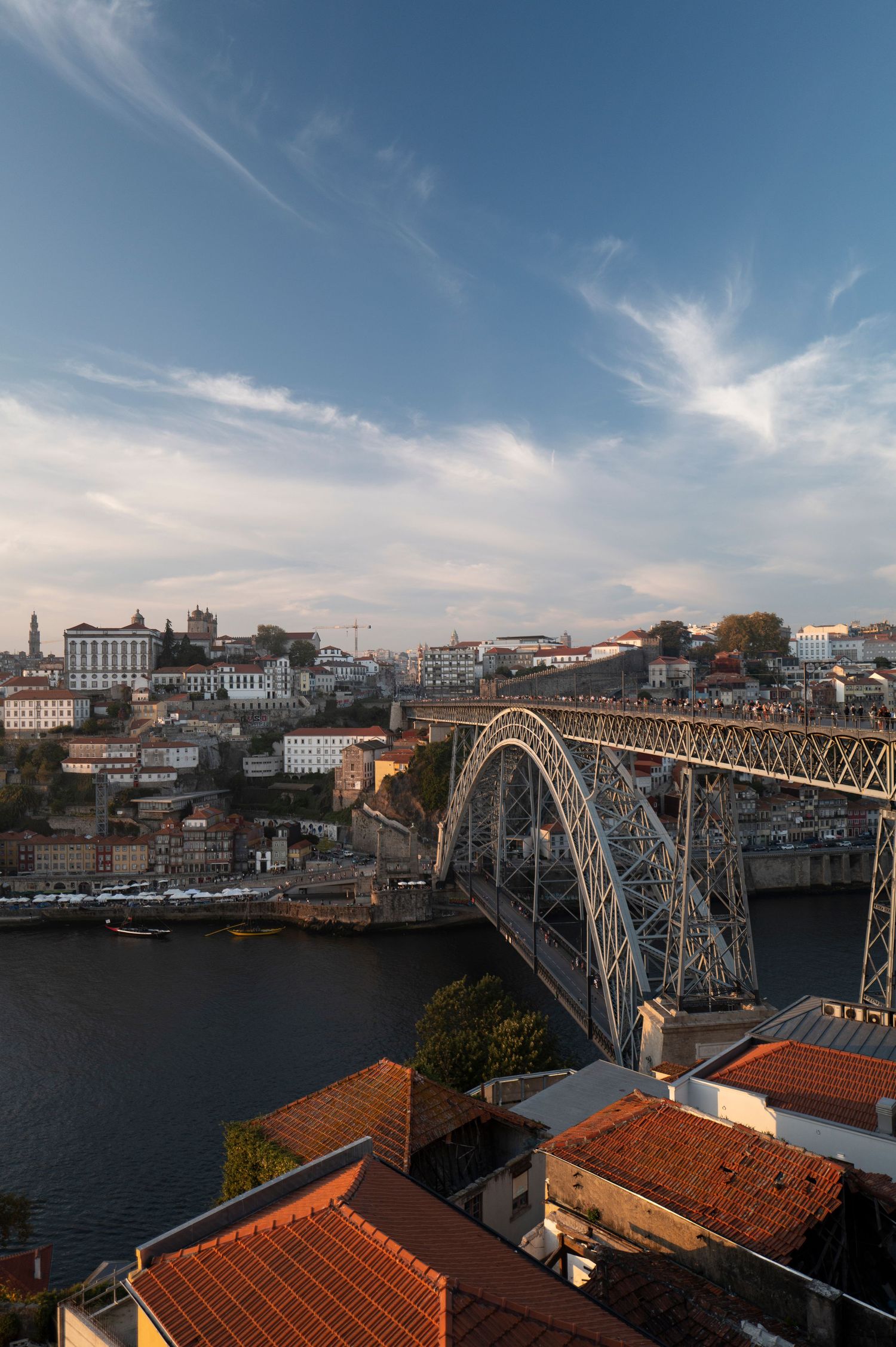 Panoramic view of Porto's iconic Dom Luis I Bridge spanning the Douro River.