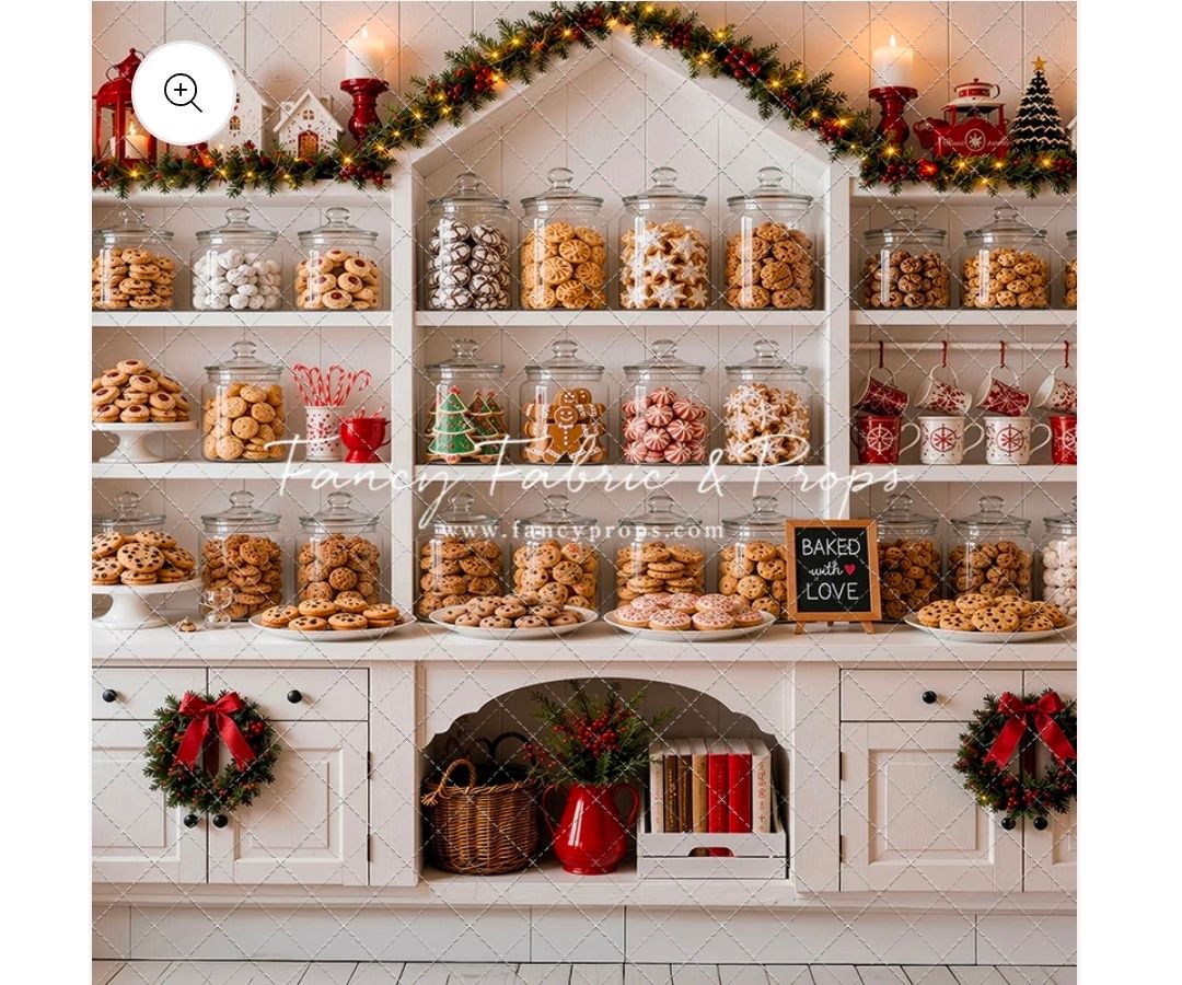 Festive Christmas cookie shop display with glass jars of assorted cookies on white shelves with holiday garland.