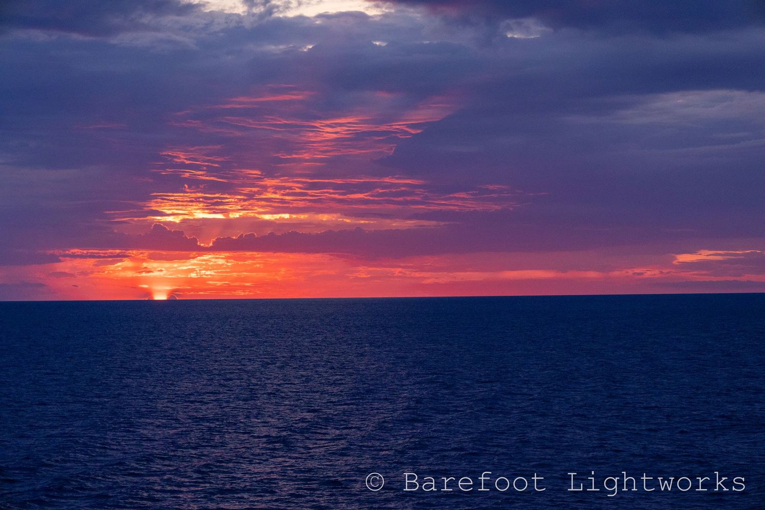A photo of an ocean sunrise