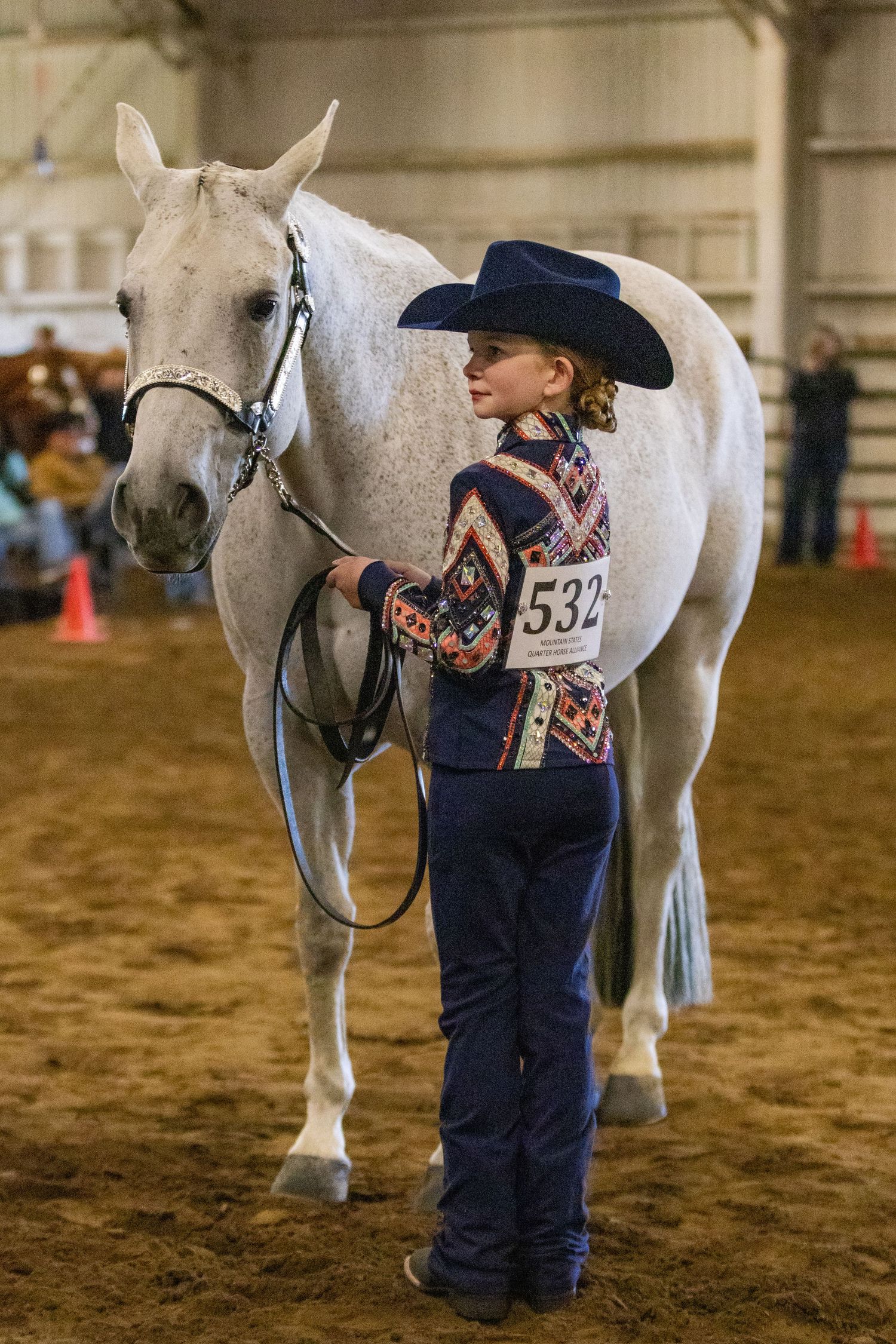 Horse show photography coverage picturing a young girl in a showmanship class with her horse at Walla Walla Fairgrounds.