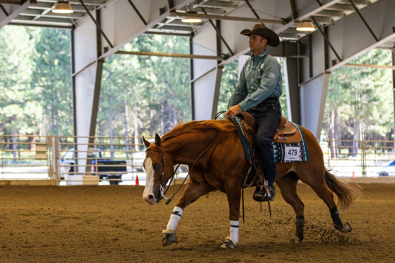Horse show photography coverage showing a reining horse run.