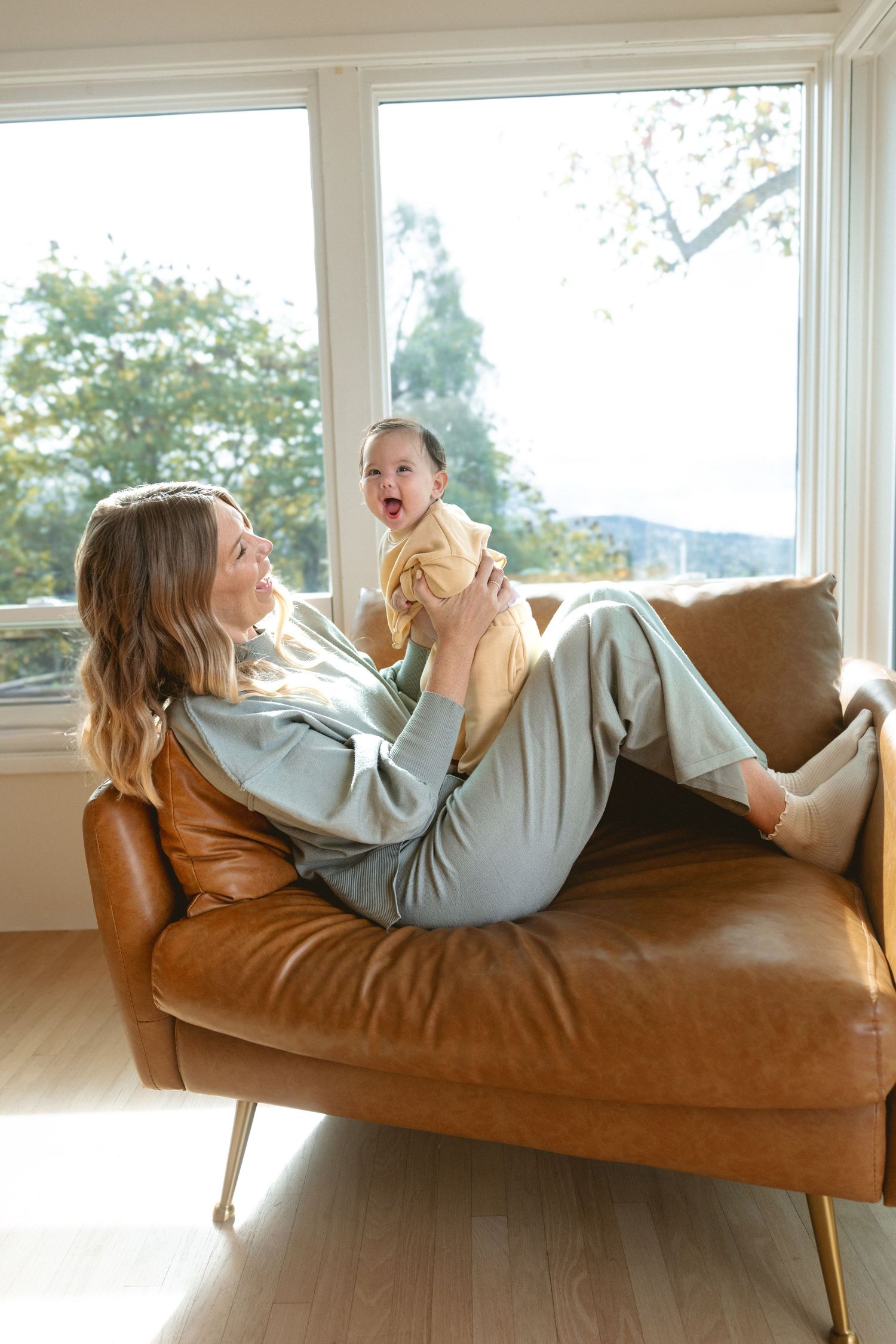 mother and her baby smiling