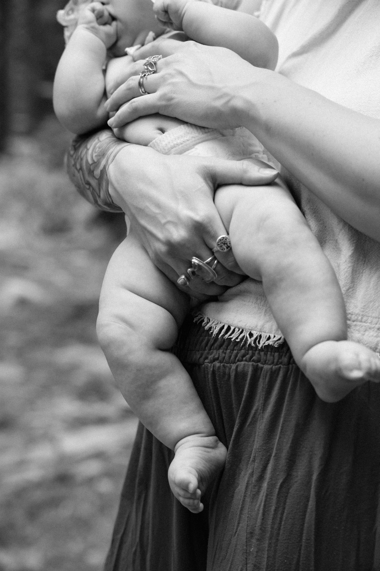 mother holding baby