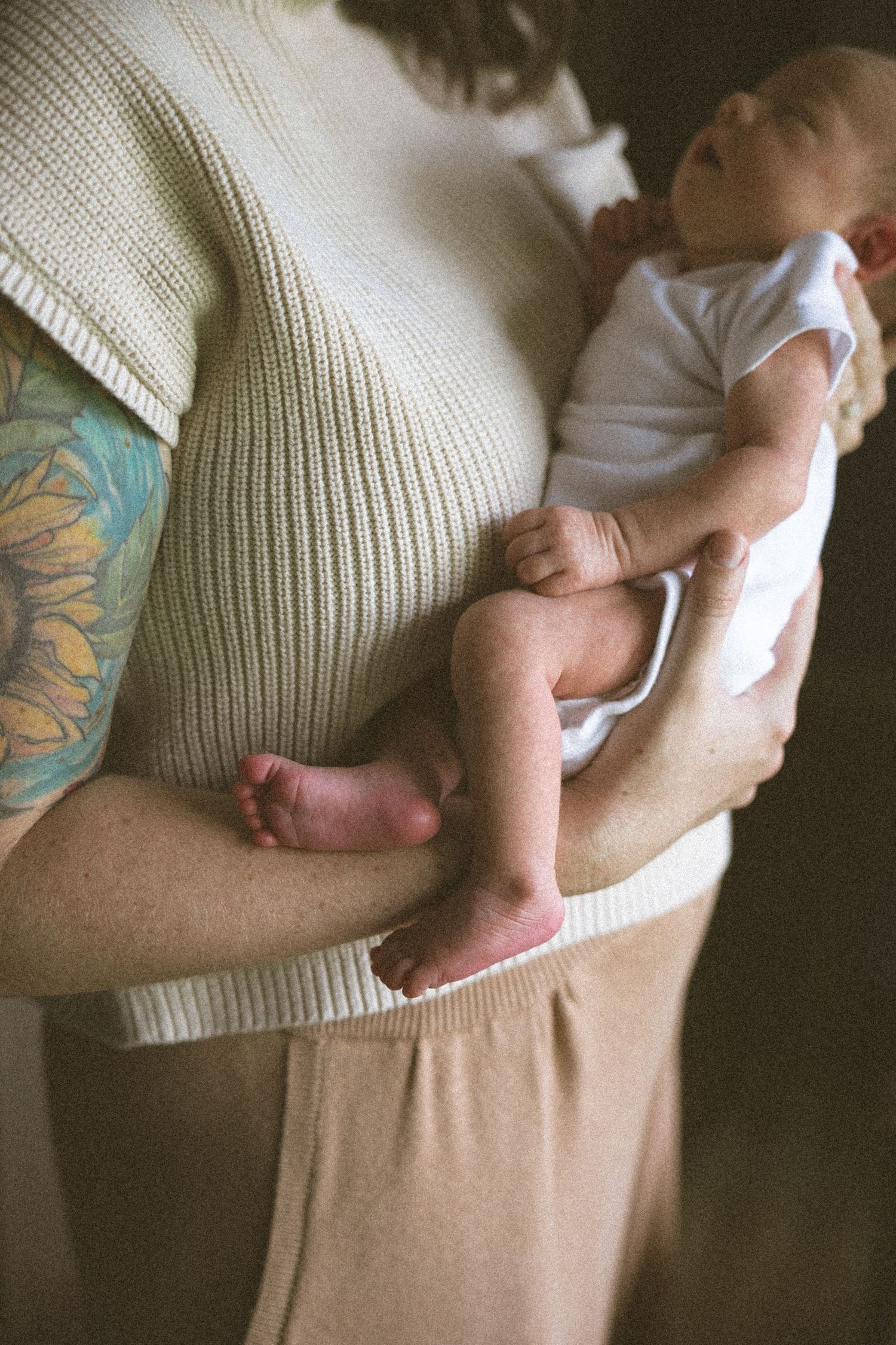 mother holding newborn baby