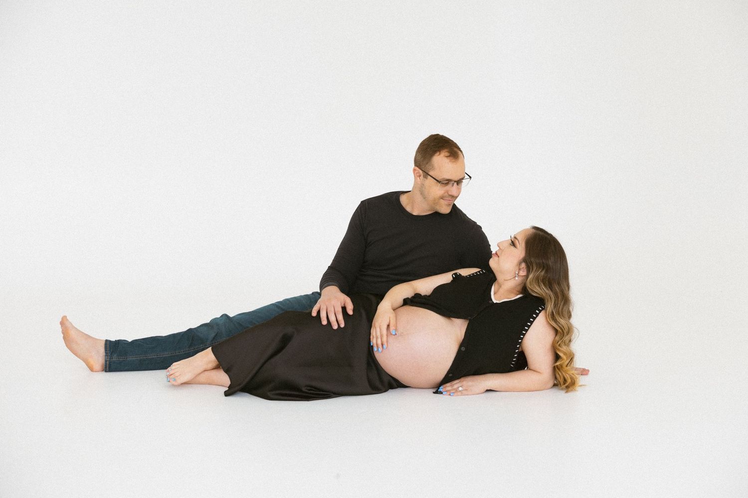 Husband and wife studio maternity photos