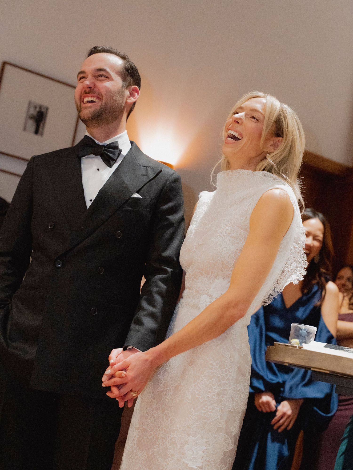 Happy couple sharing a joyful moment during their wedding celebration.