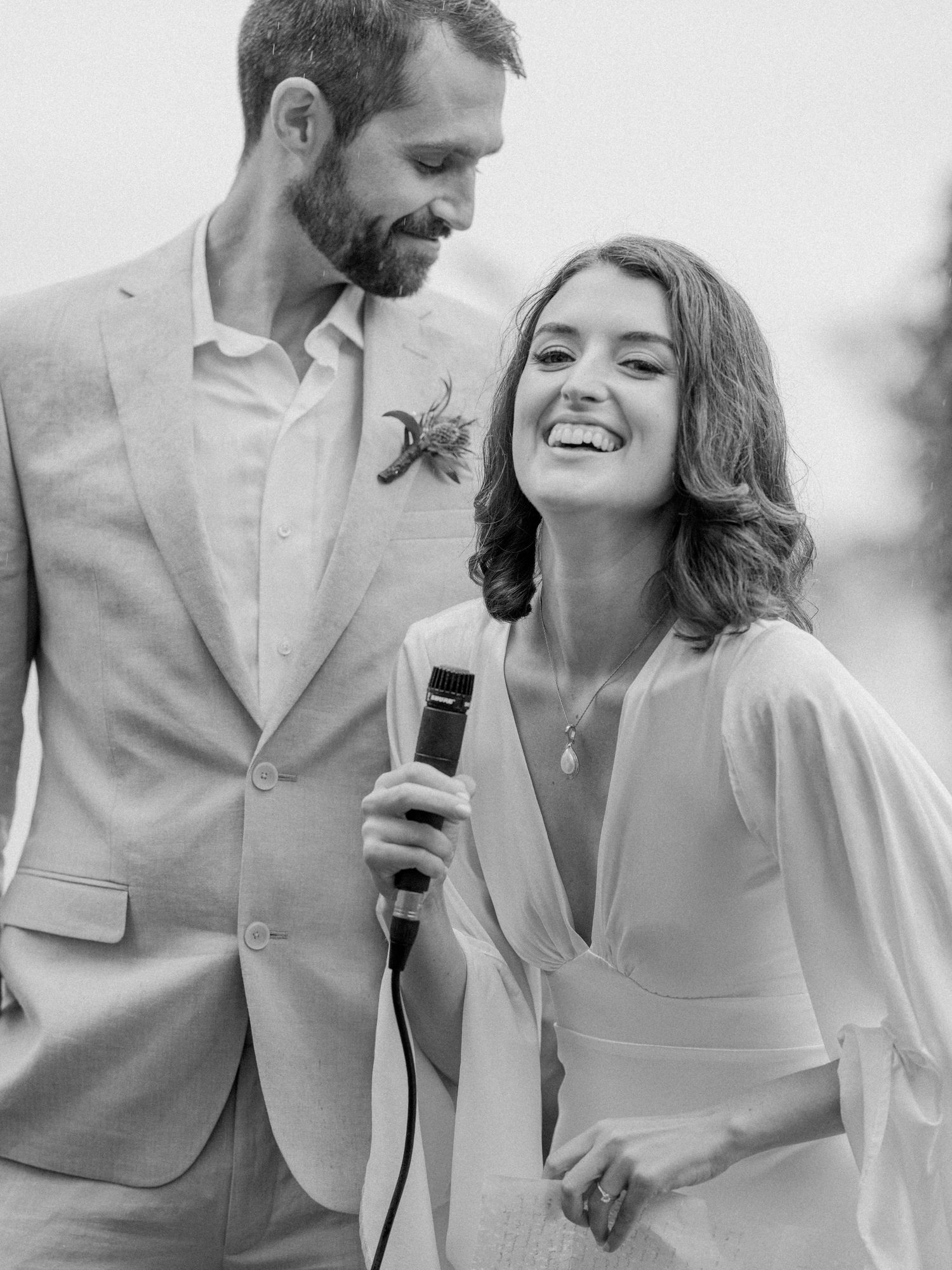 Black and white wedding sequence showing joyful moments and laughter.