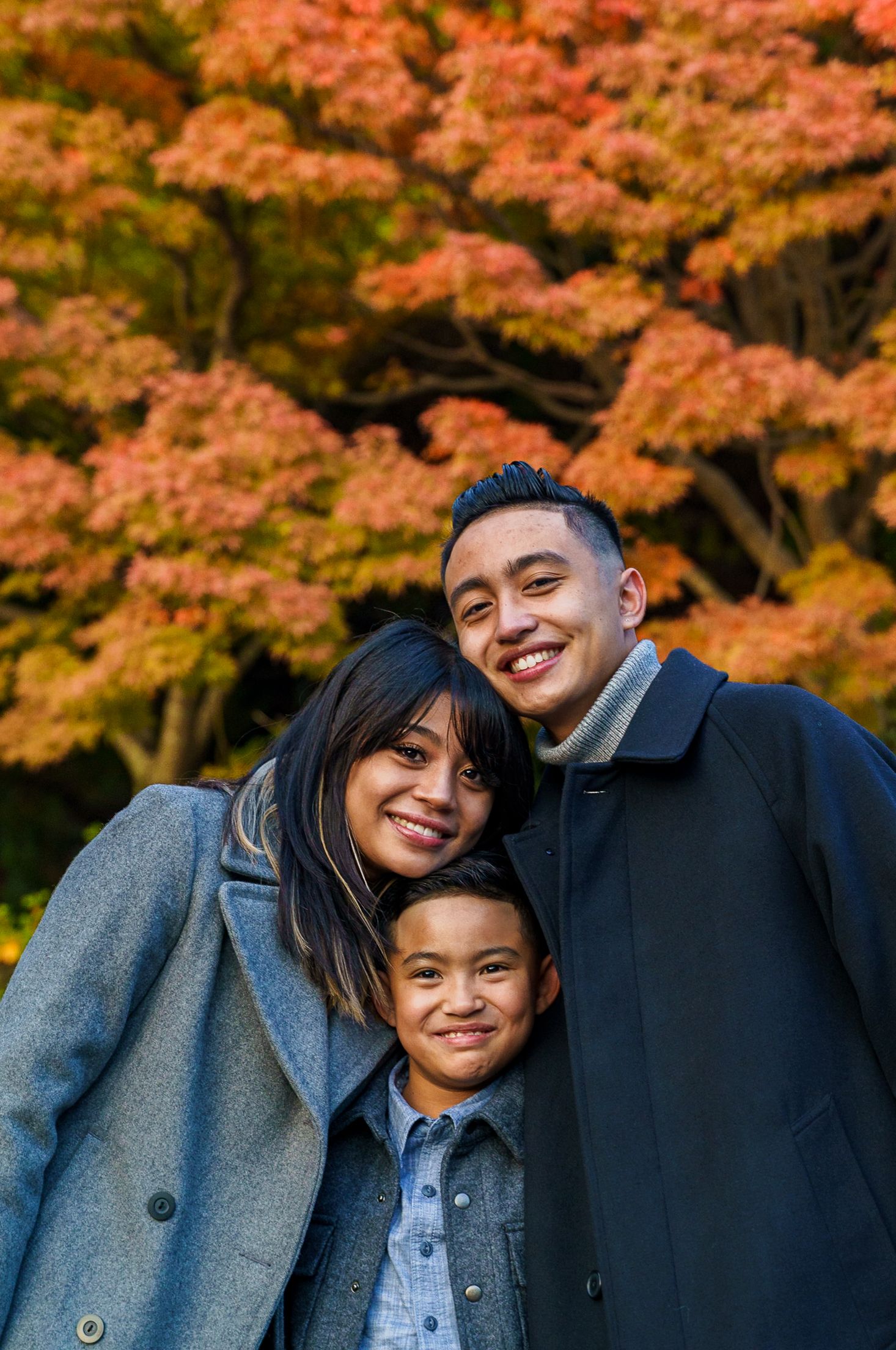 Family photo of Norfolk at park during golden hour