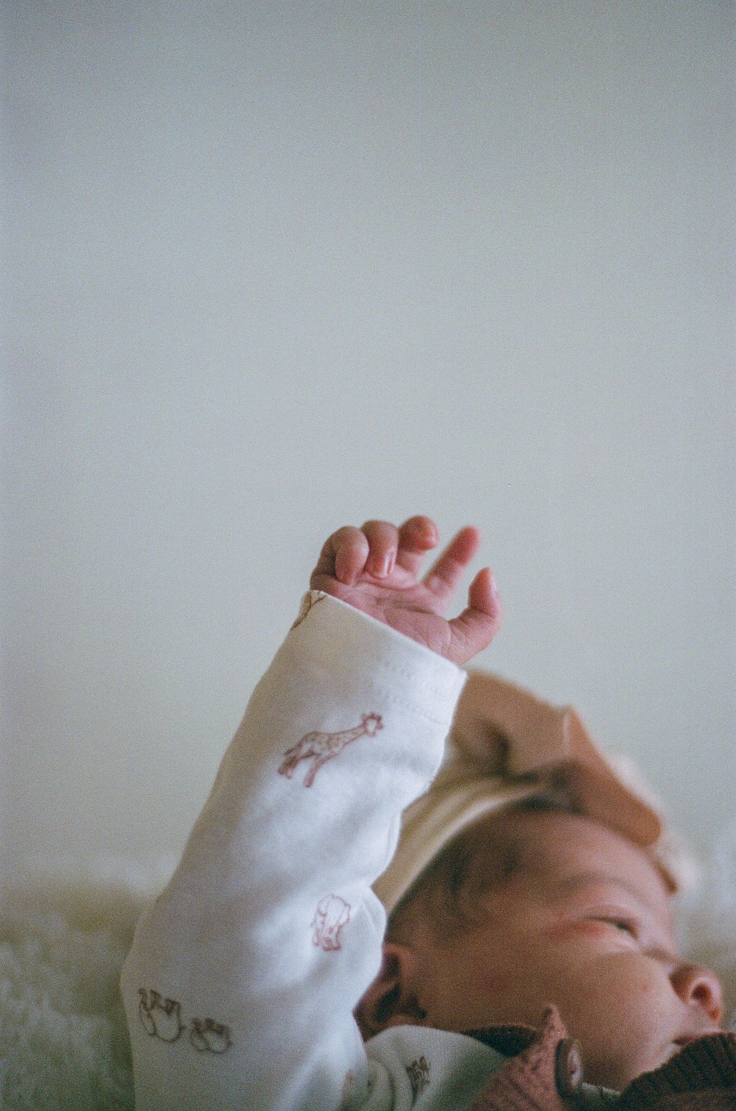 Newborn photography session captured on 35mm film by Klean Vision Photo, a Norfolk and Virginia Beach photographer