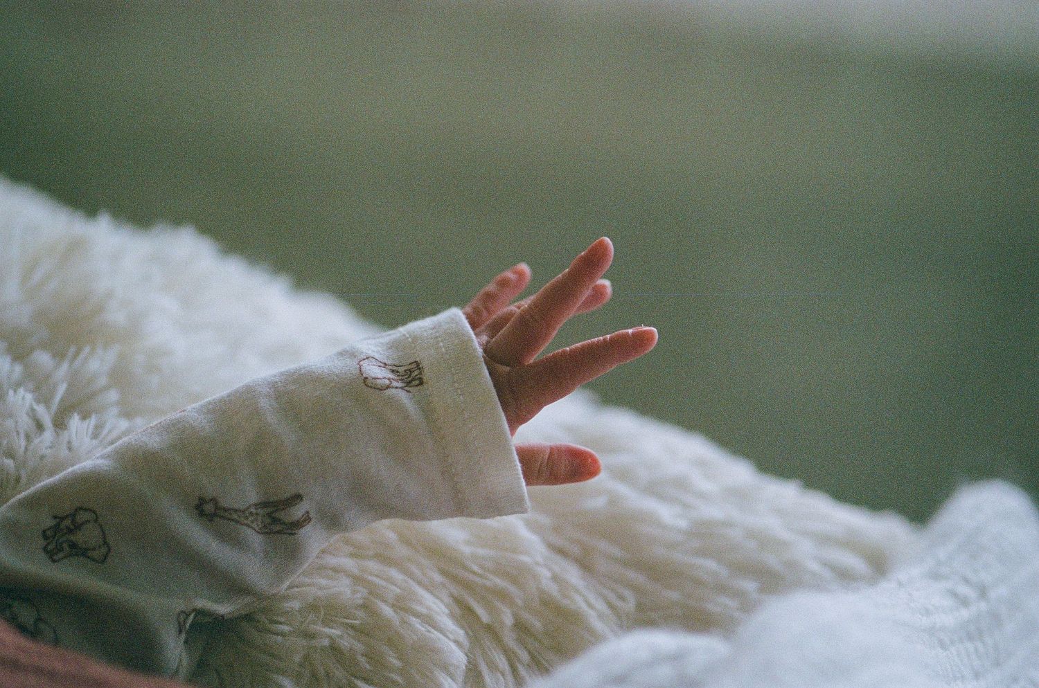 Newborn photography session captured on 35mm film by Klean Vision Photo, a Norfolk and Virginia Beach photographer
