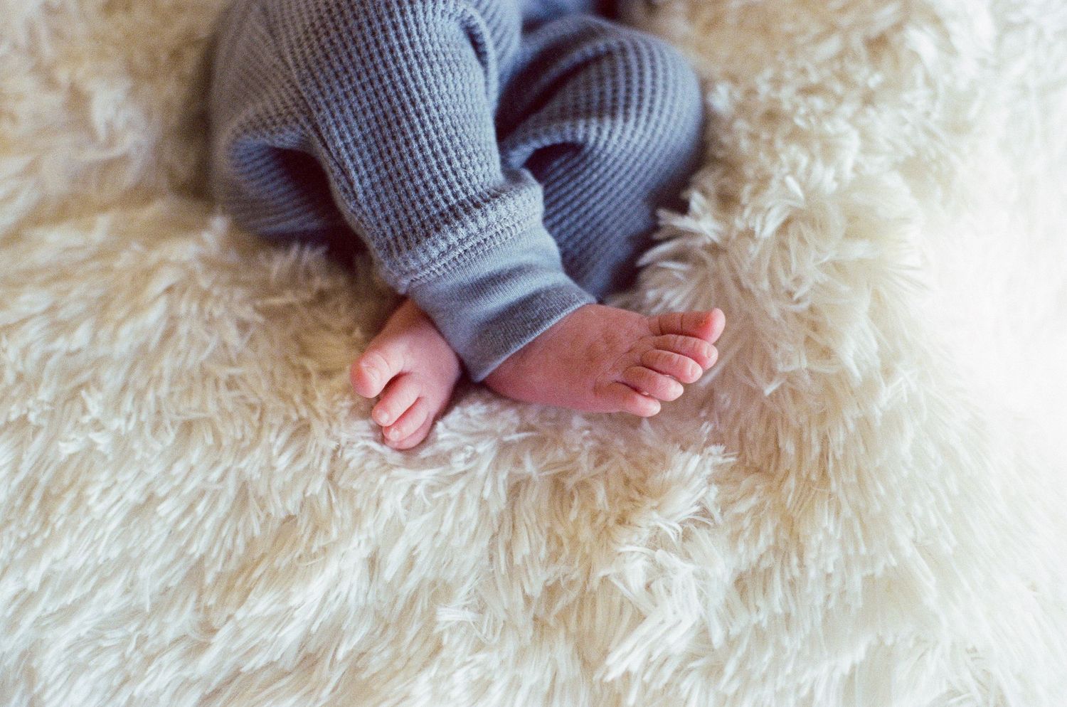 Newborn photography session captured on 35mm film by Klean Vision Photo, a Norfolk and Virginia Beach photographer