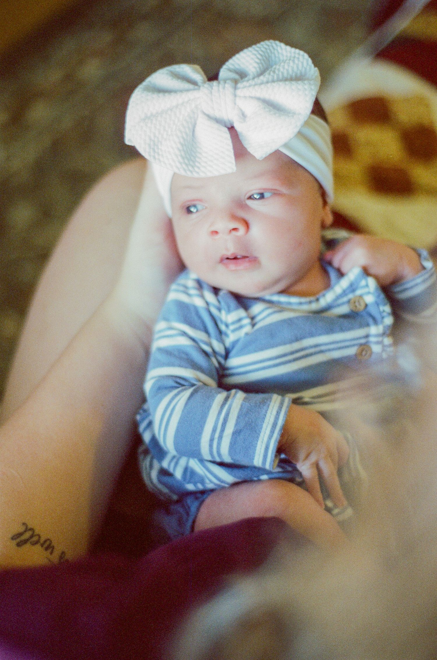 Newborn photography session captured on 35mm film by Klean Vision Photo, a Norfolk and Virginia Beach photographer