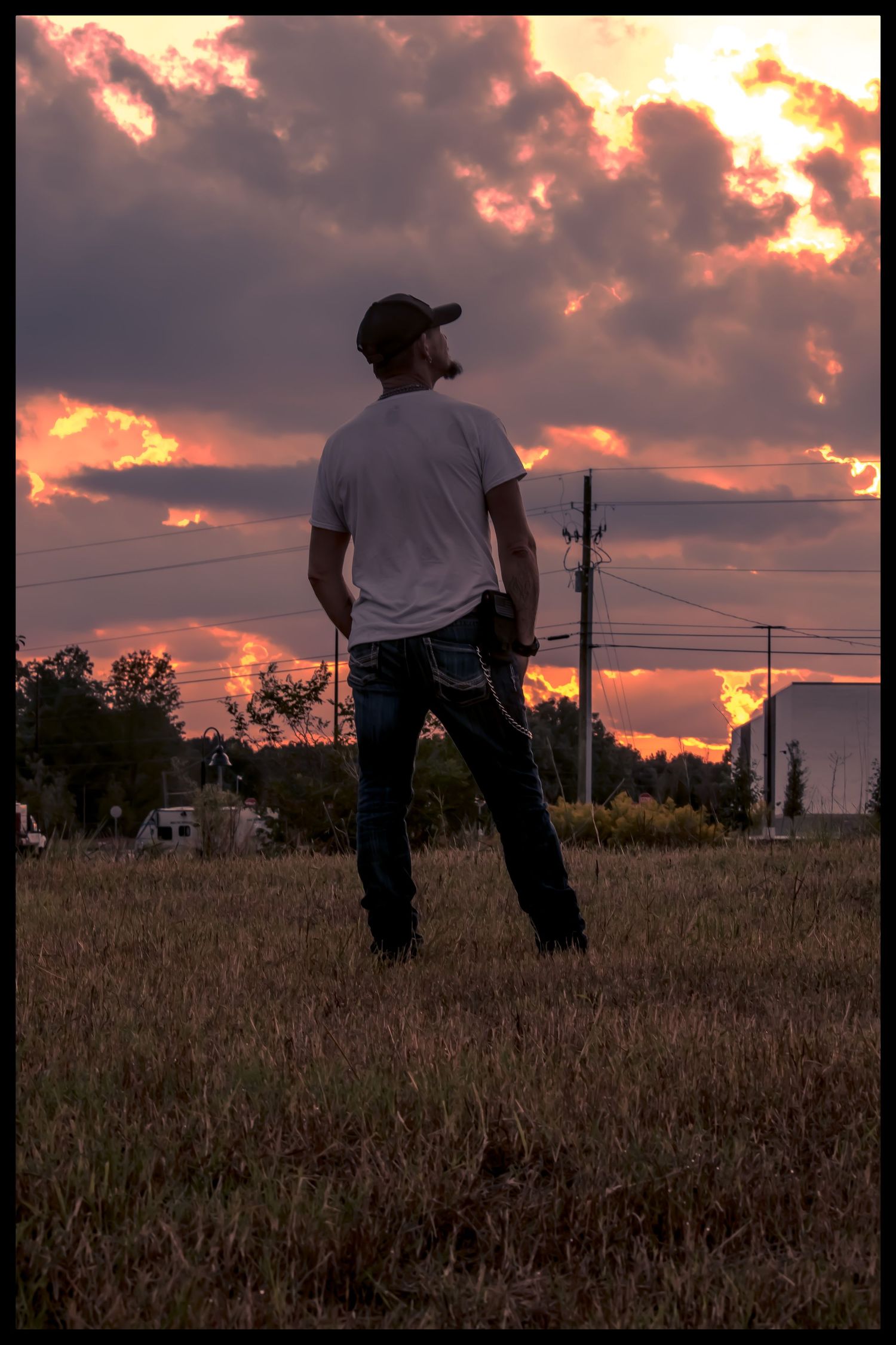 man with sunset in background