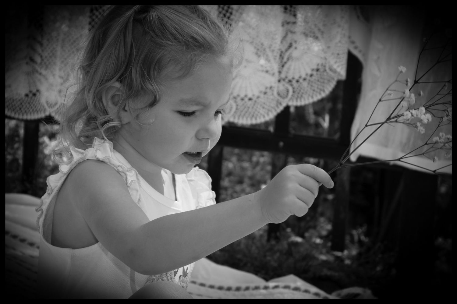 black and white photo of a 2 year old girl