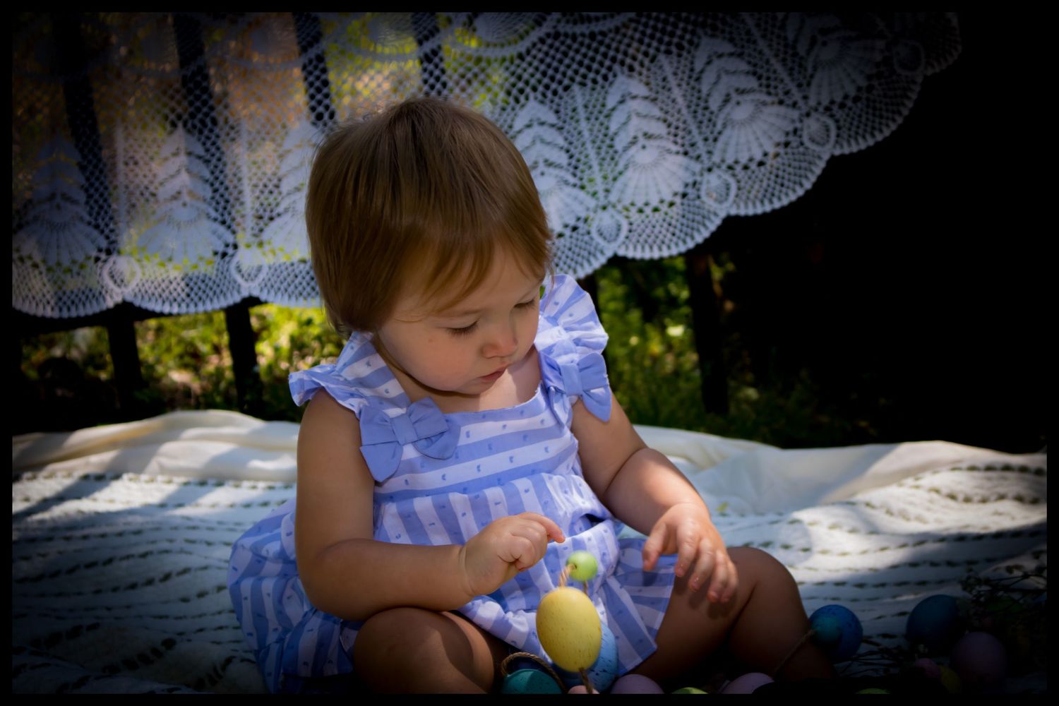 baby playing with a toy