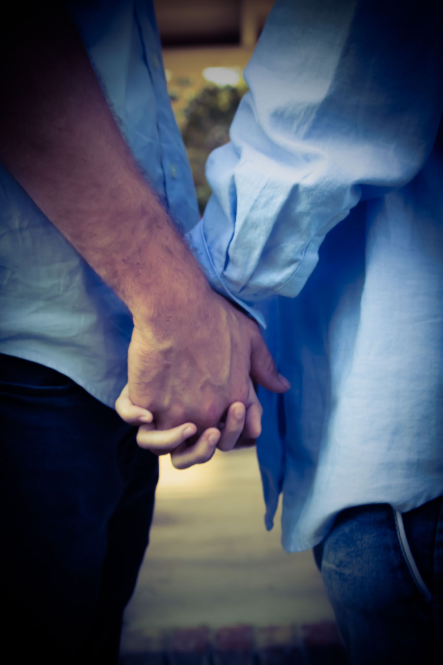A couple holding hands