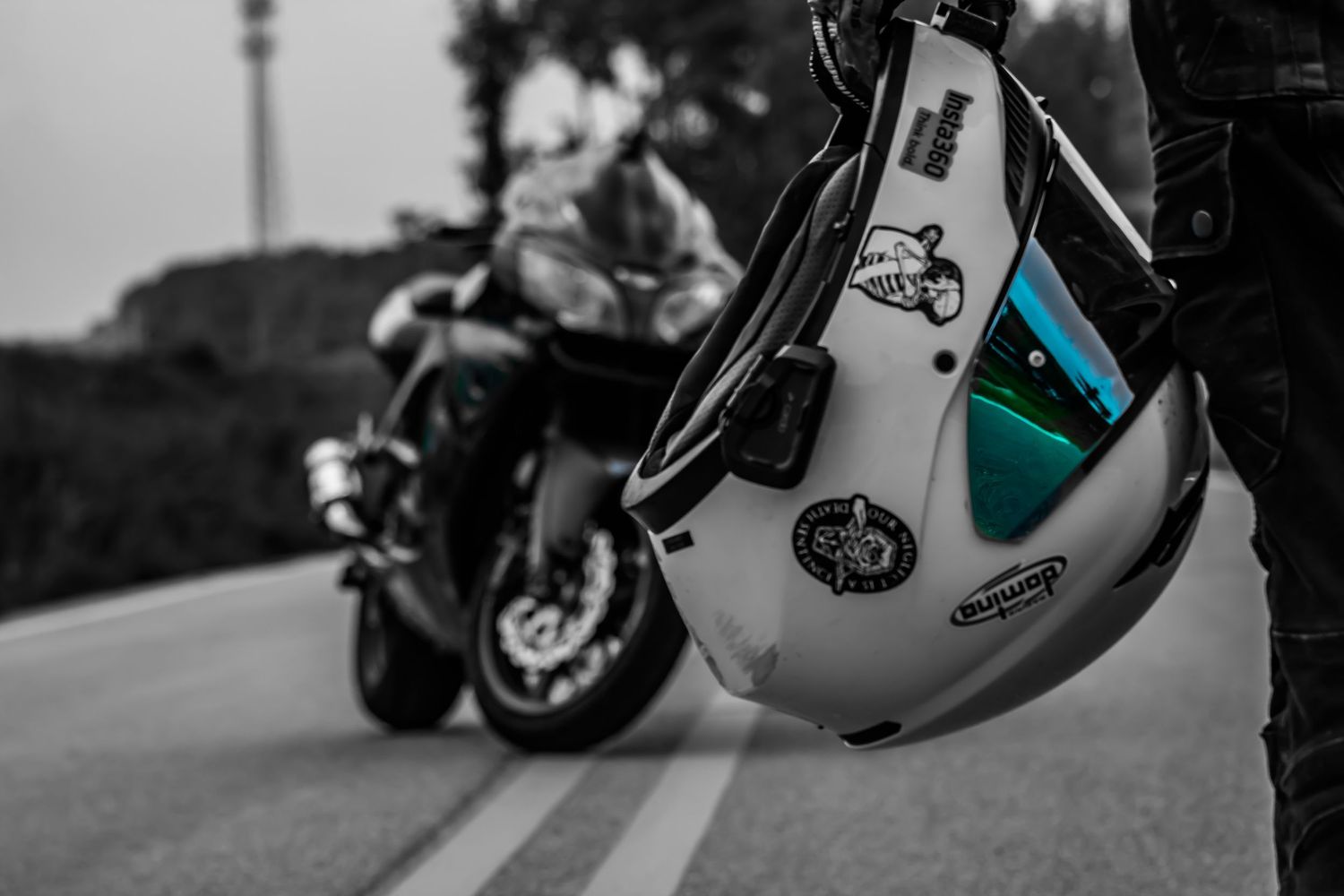 motorcycle helmet with a motorcycle in the background