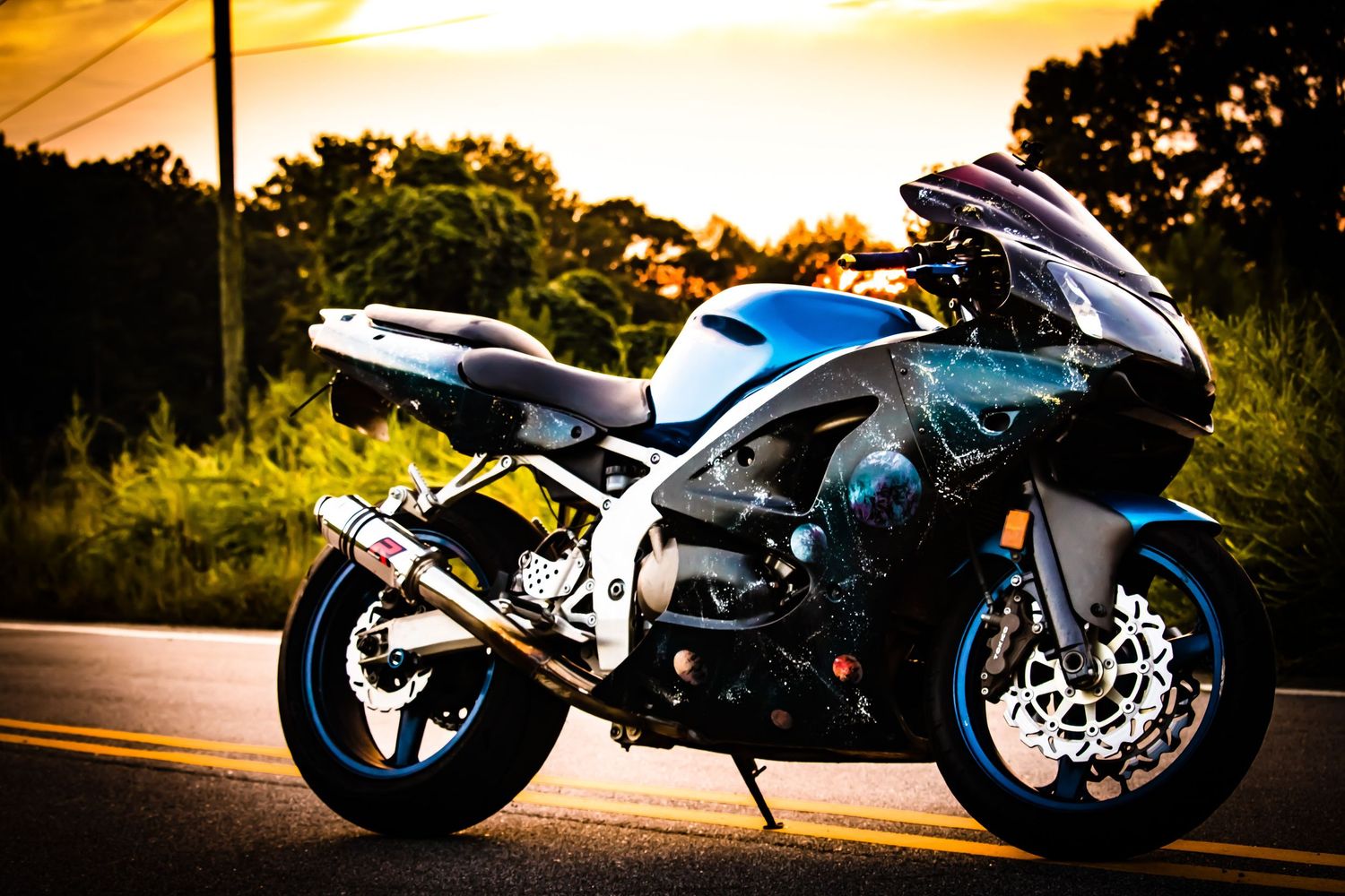 motorcycle with sunset in background