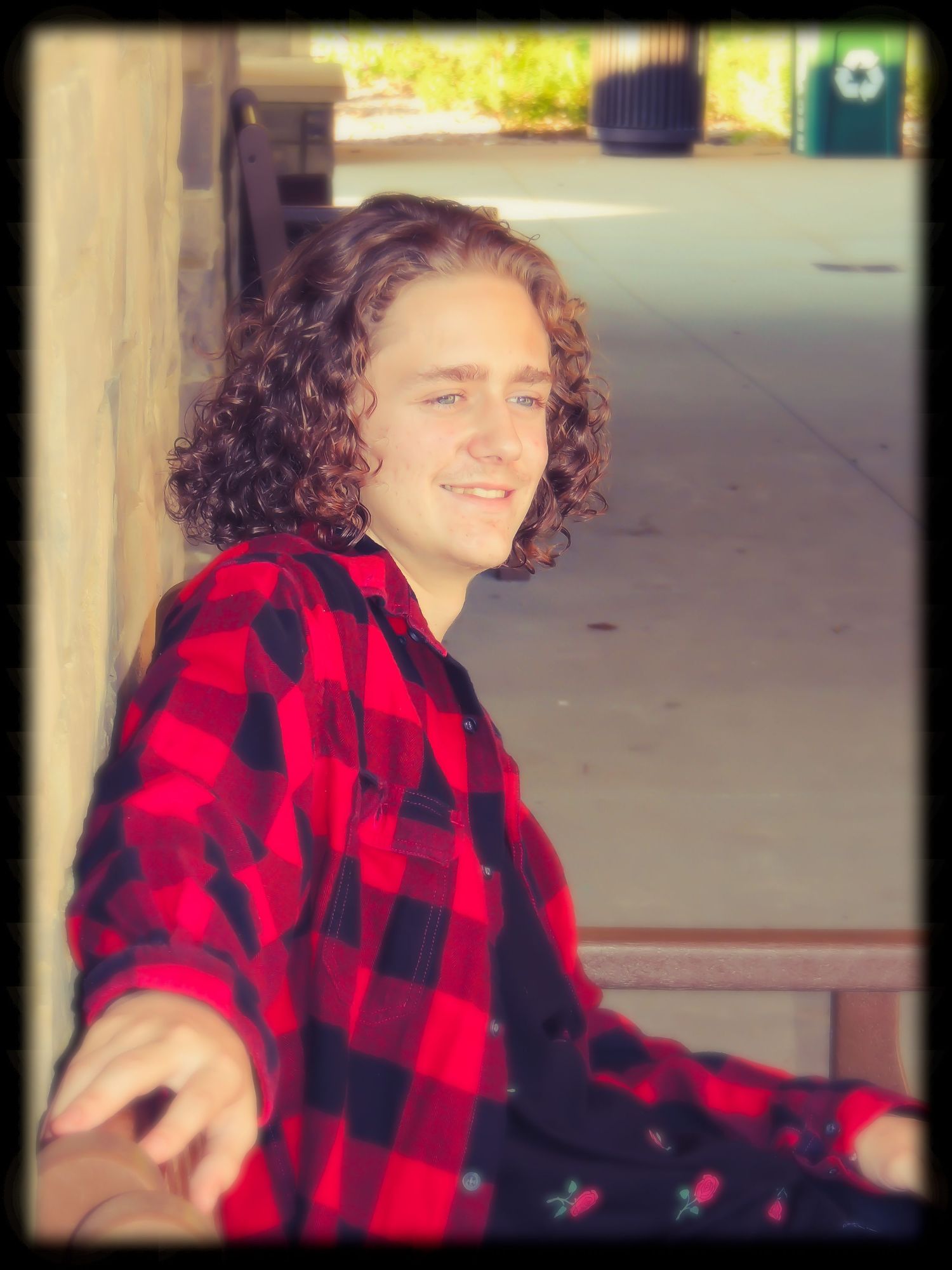 boy sitting on bench