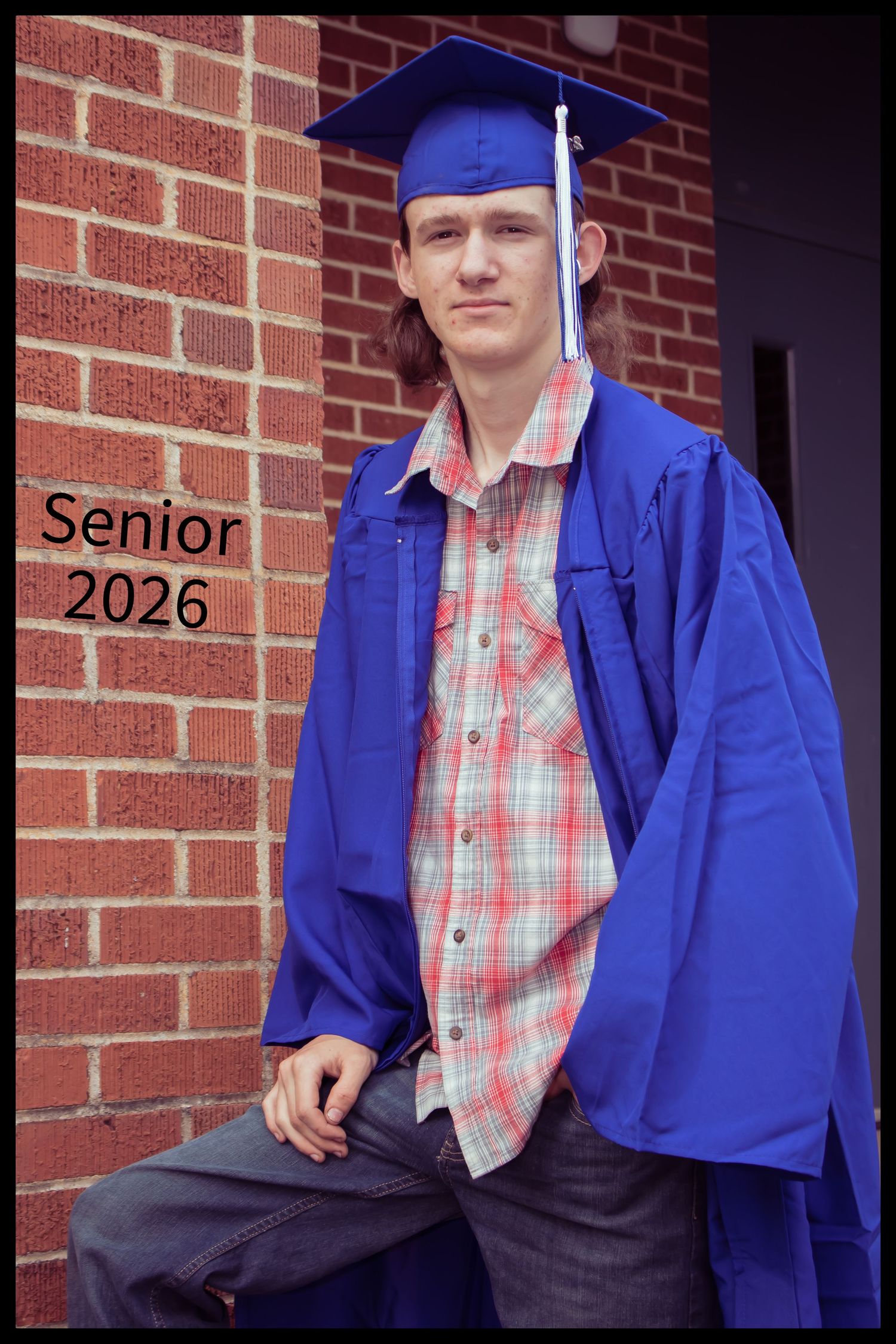 High school graduating boy