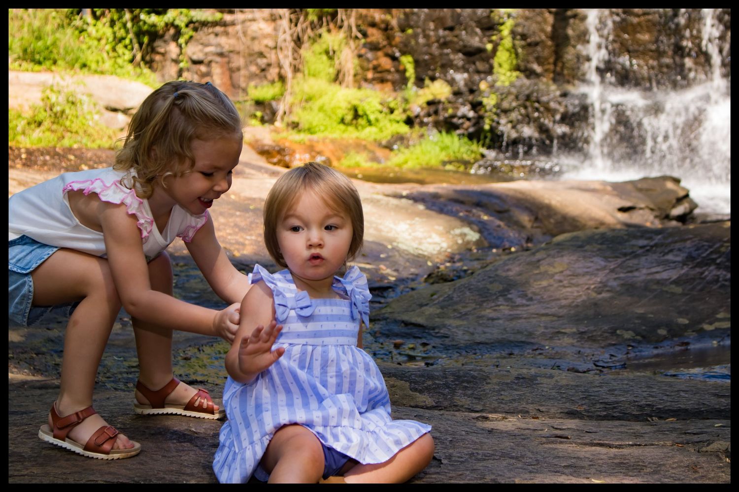 little girl playing with her sister