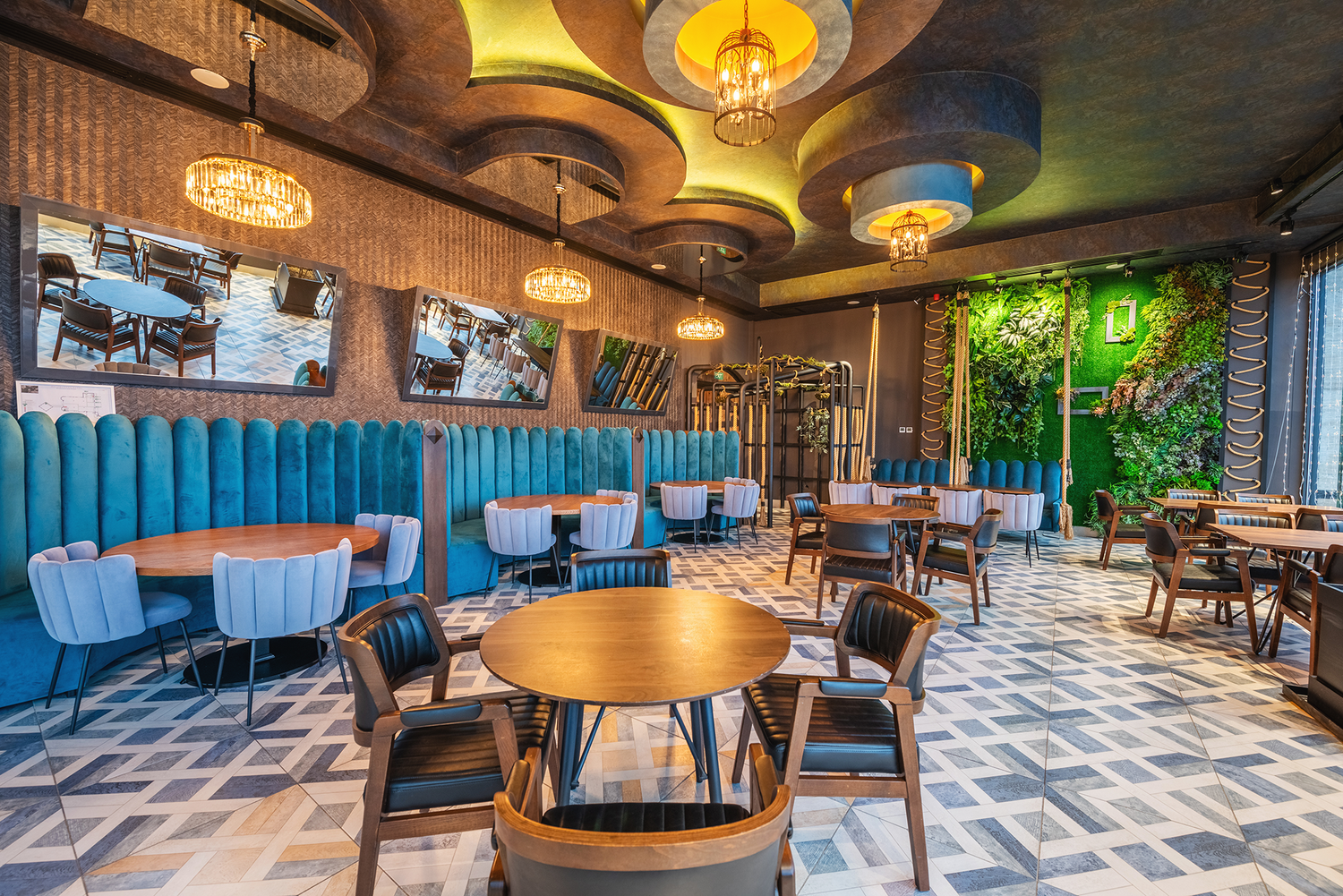 Stylish restaurant interior with colorful modern furniture and lush decor—great for hospitality, interior design, or restaurant branding.