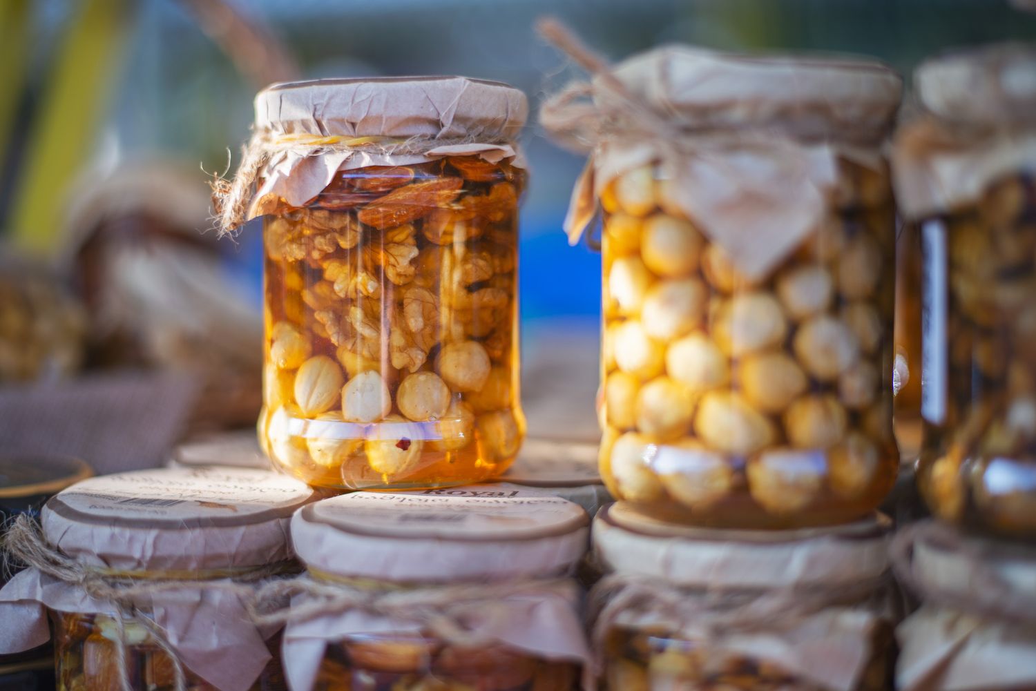 Packaged snacks and puffed corn in transparent bags at a local market.