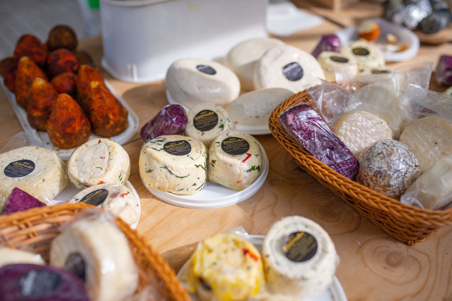 Close-up of assorted pastries and desserts displayed on a bakery counter—ideal for culinary, cafe, or lifestyle visuals.