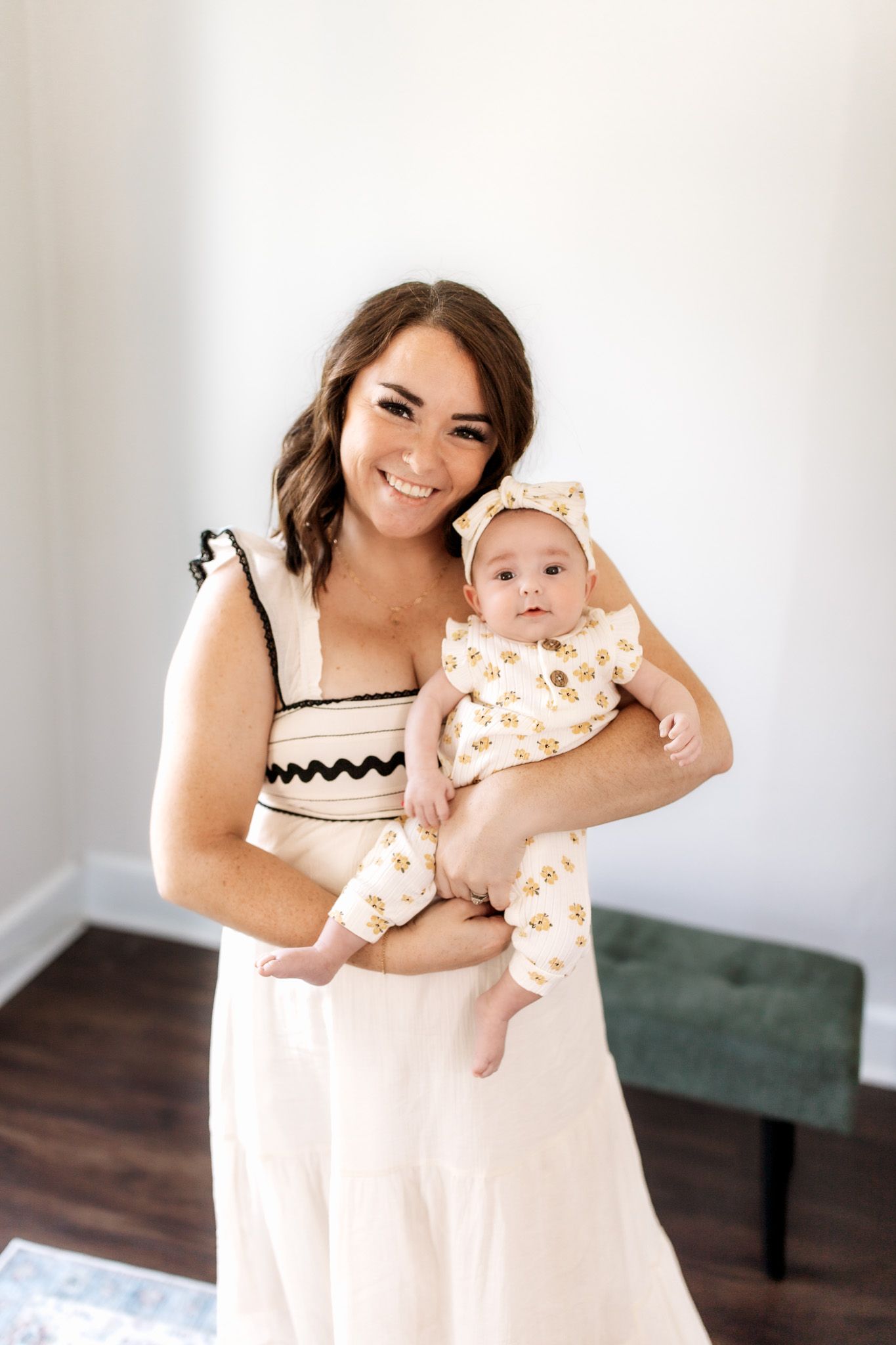 Studio family photography of mother and daughter posing together, photographed by Jessica Rose Photography, Janesville WI.