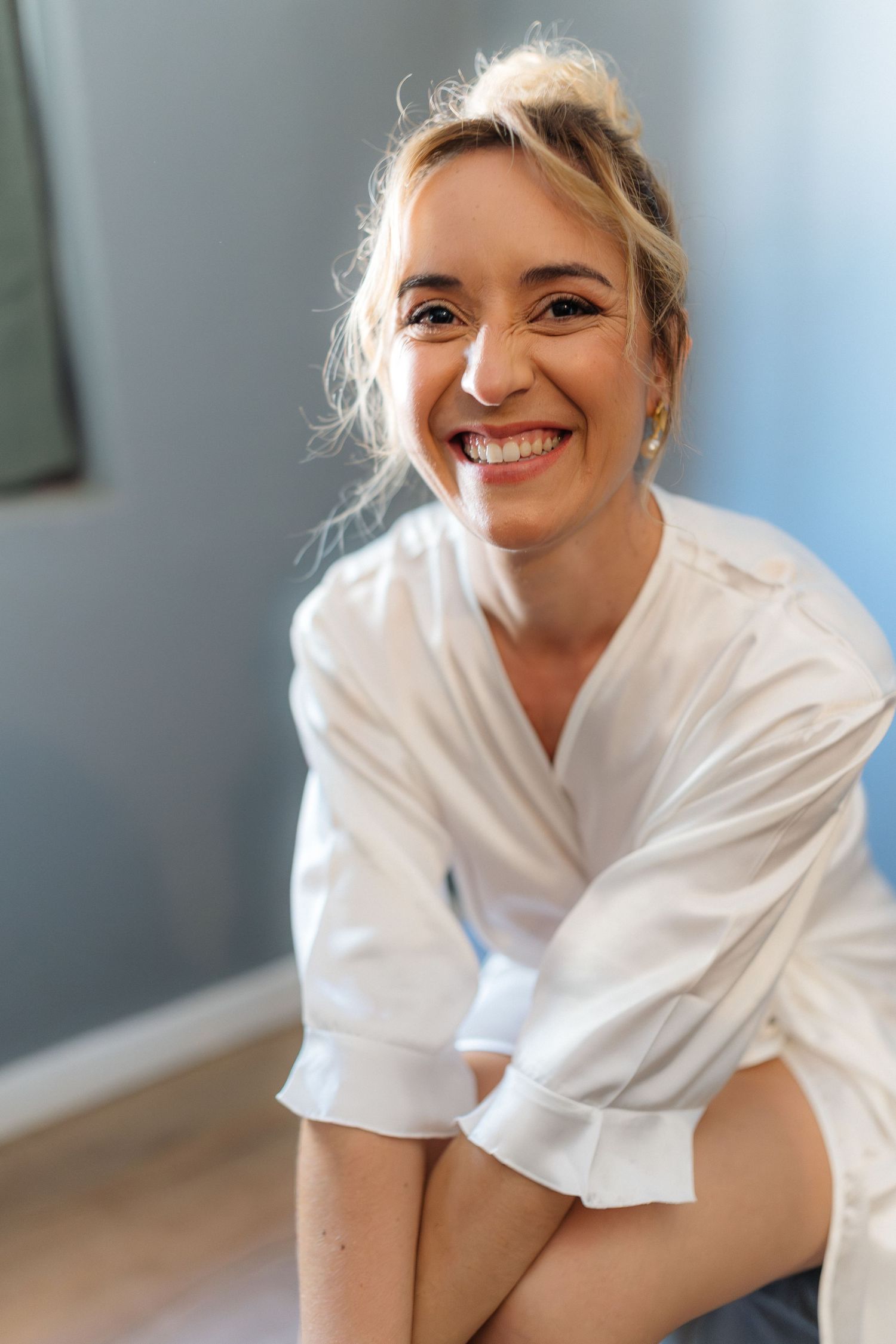 Series of expressive portraits showing joyful emotions in bright interior setting.