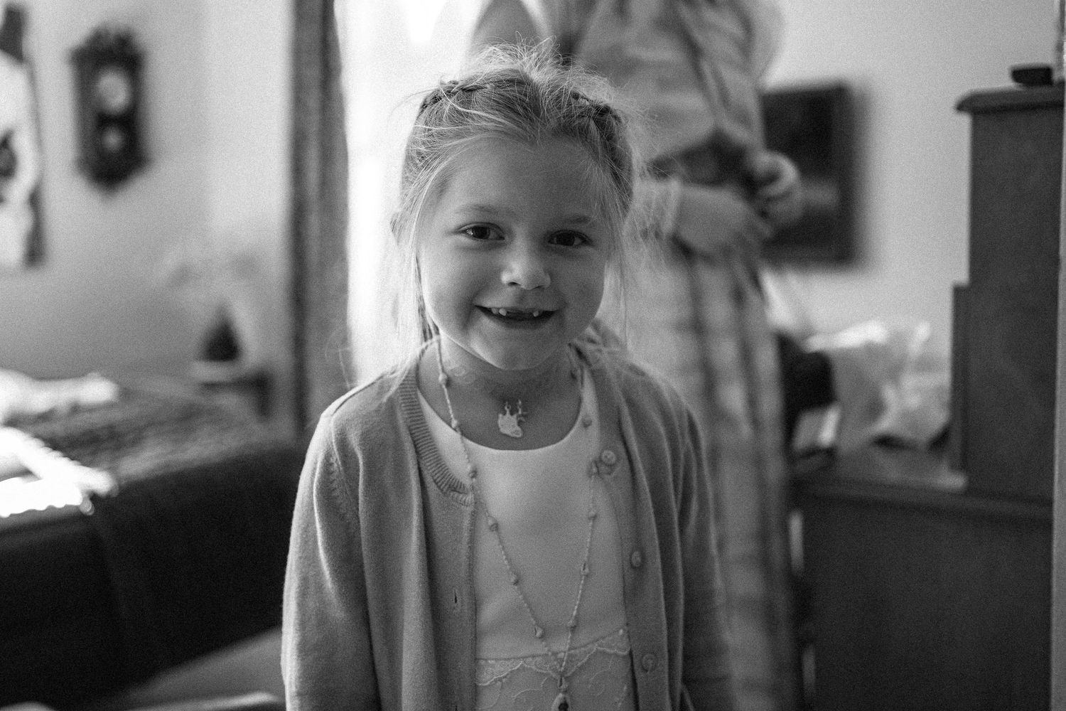 Black and white portrait series showing various expressions.