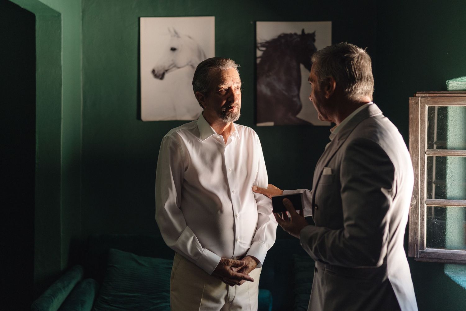 Series of candid moments captured in a room with dark green walls and window light.