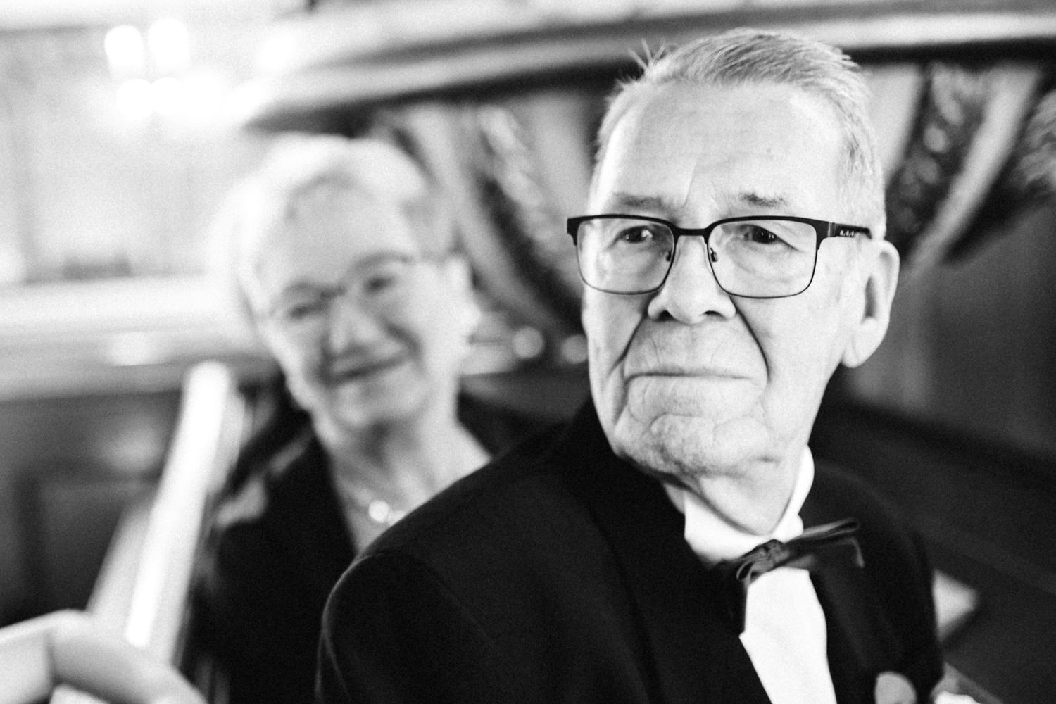 Black and white portrait series of wedding guests in a candid style.