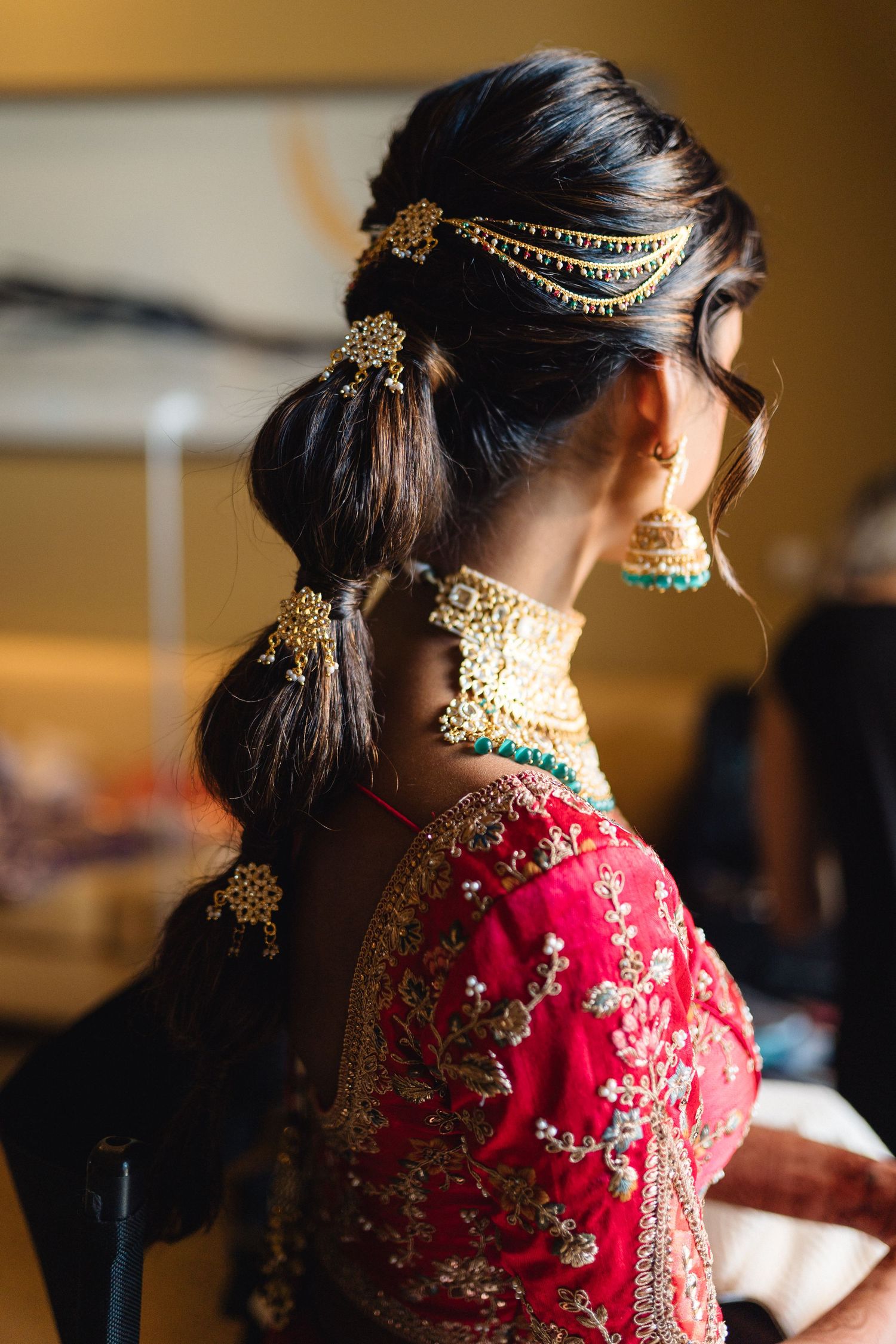 Traditional Indian bridal jewelry and headpiece adorned with intricate gold details.