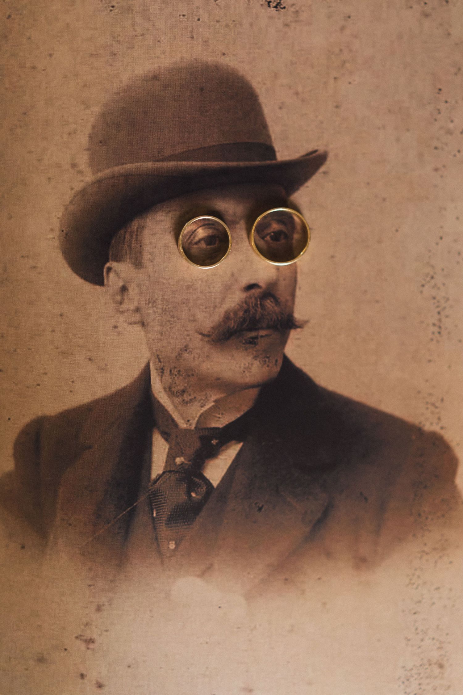 Vintage sepia photographs showing a person in a hat and glasses in different poses.