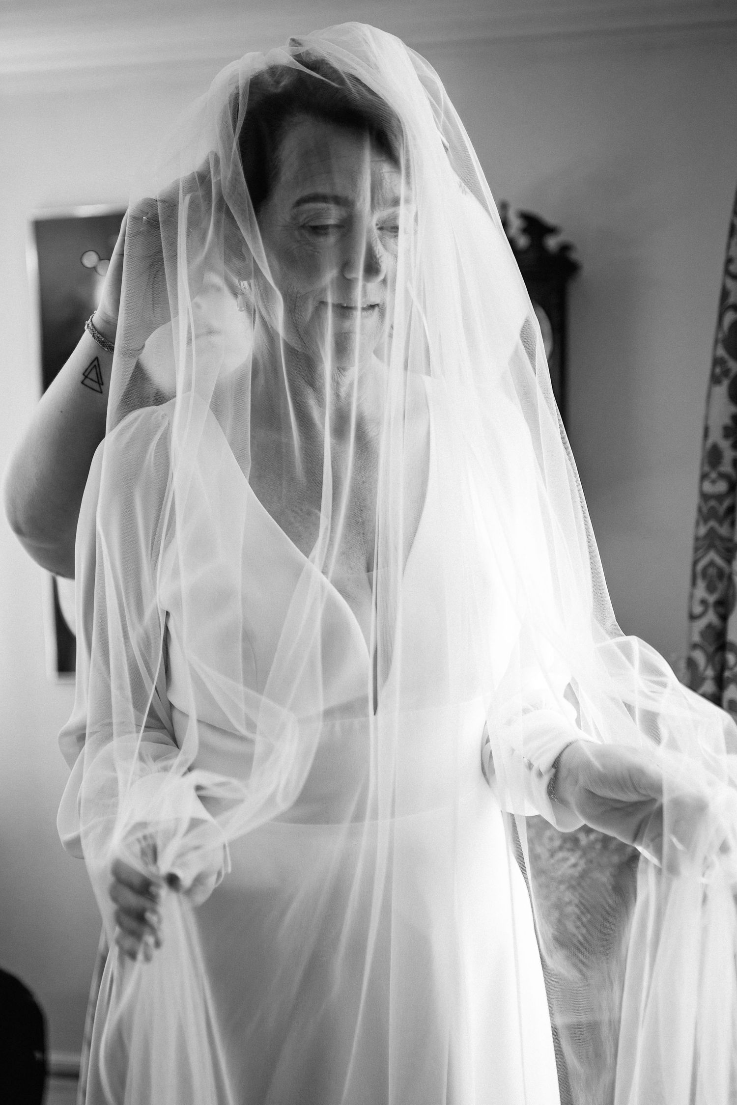 A series of ethereal bridal portraits showing a woman in a white veil against a light background.