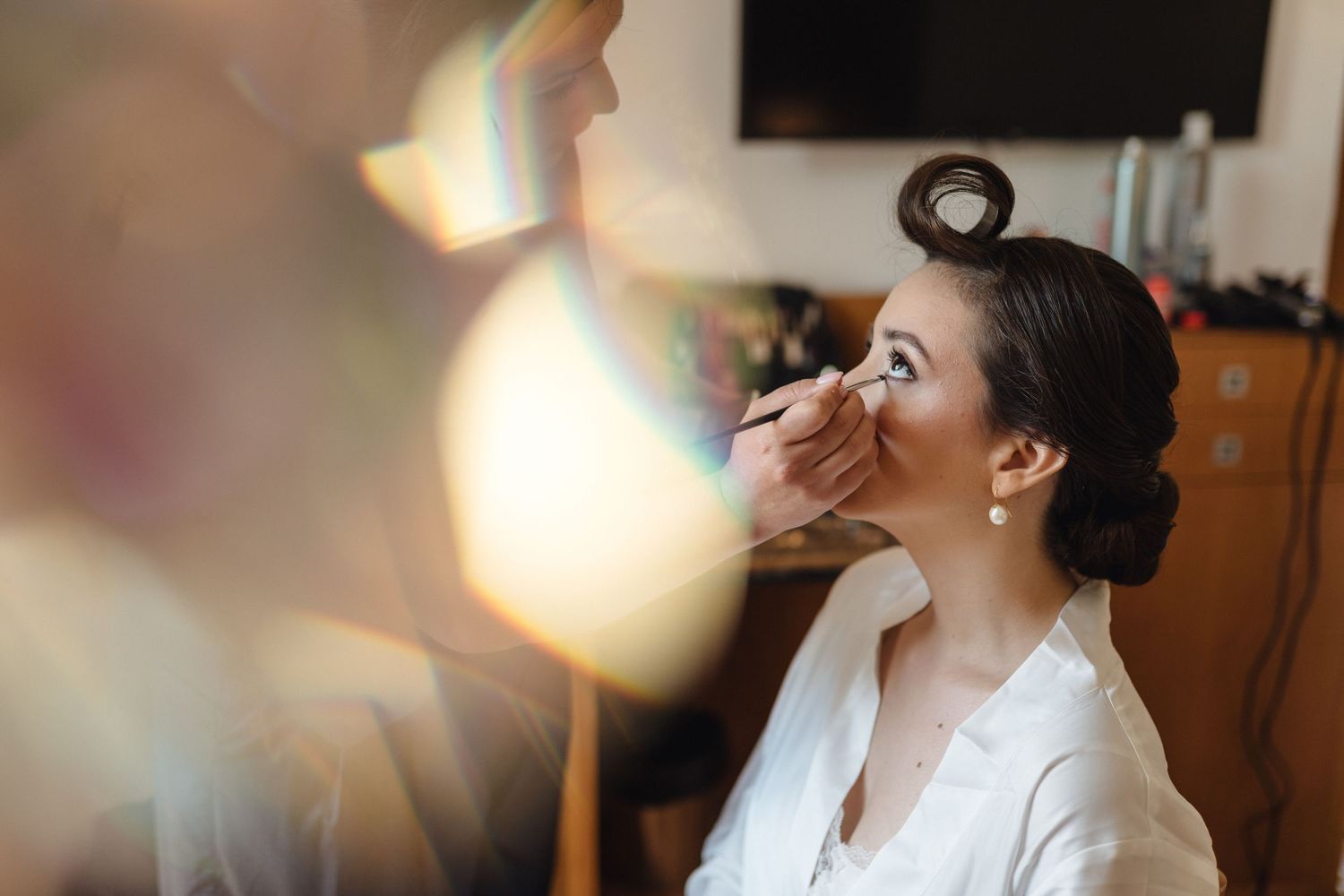 Series of candid getting ready moments captured through a dreamy lens effect.