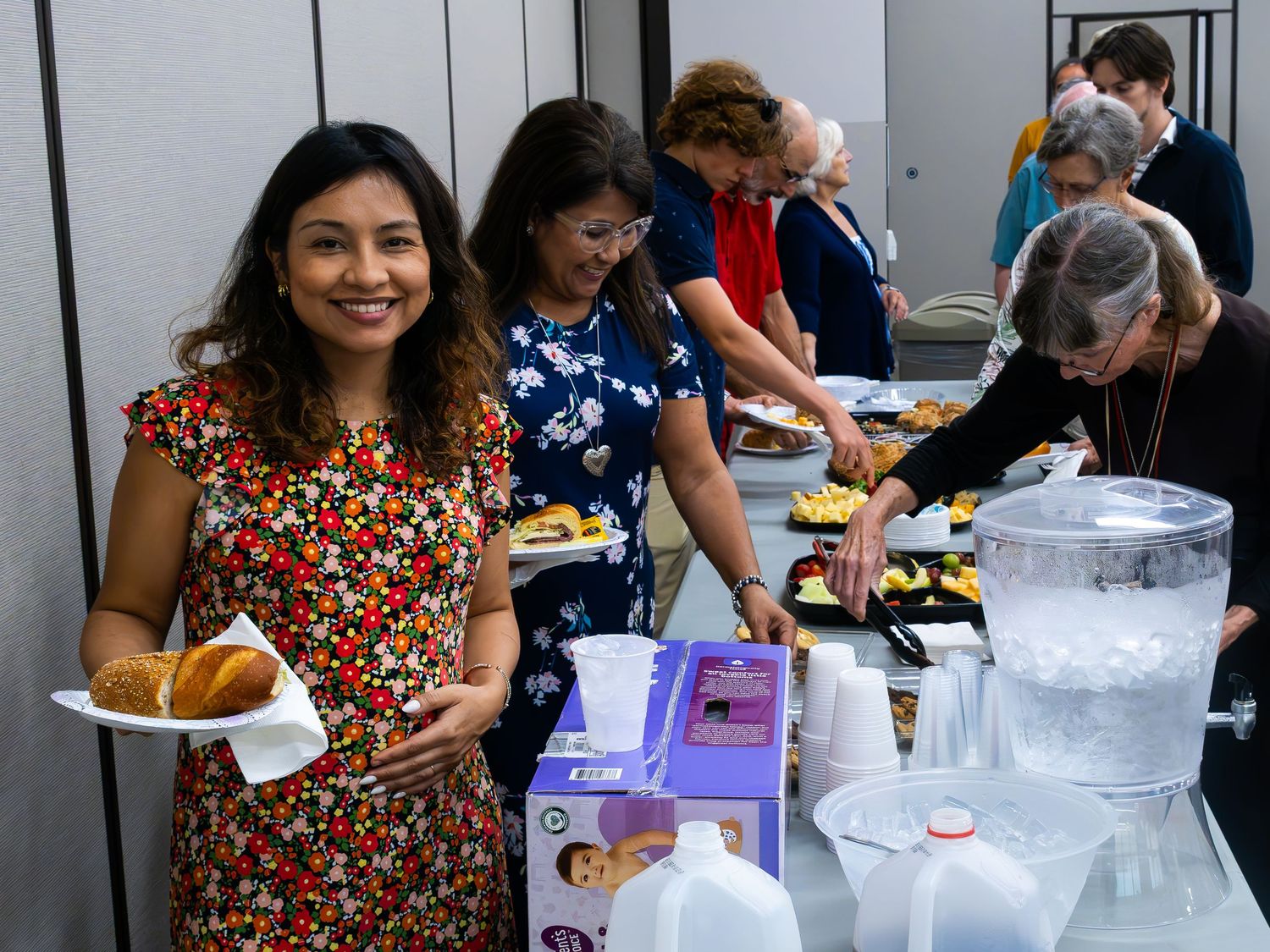 Candid corporate event photography of attendees at a catered business networking session in Warner Robins Georgia.