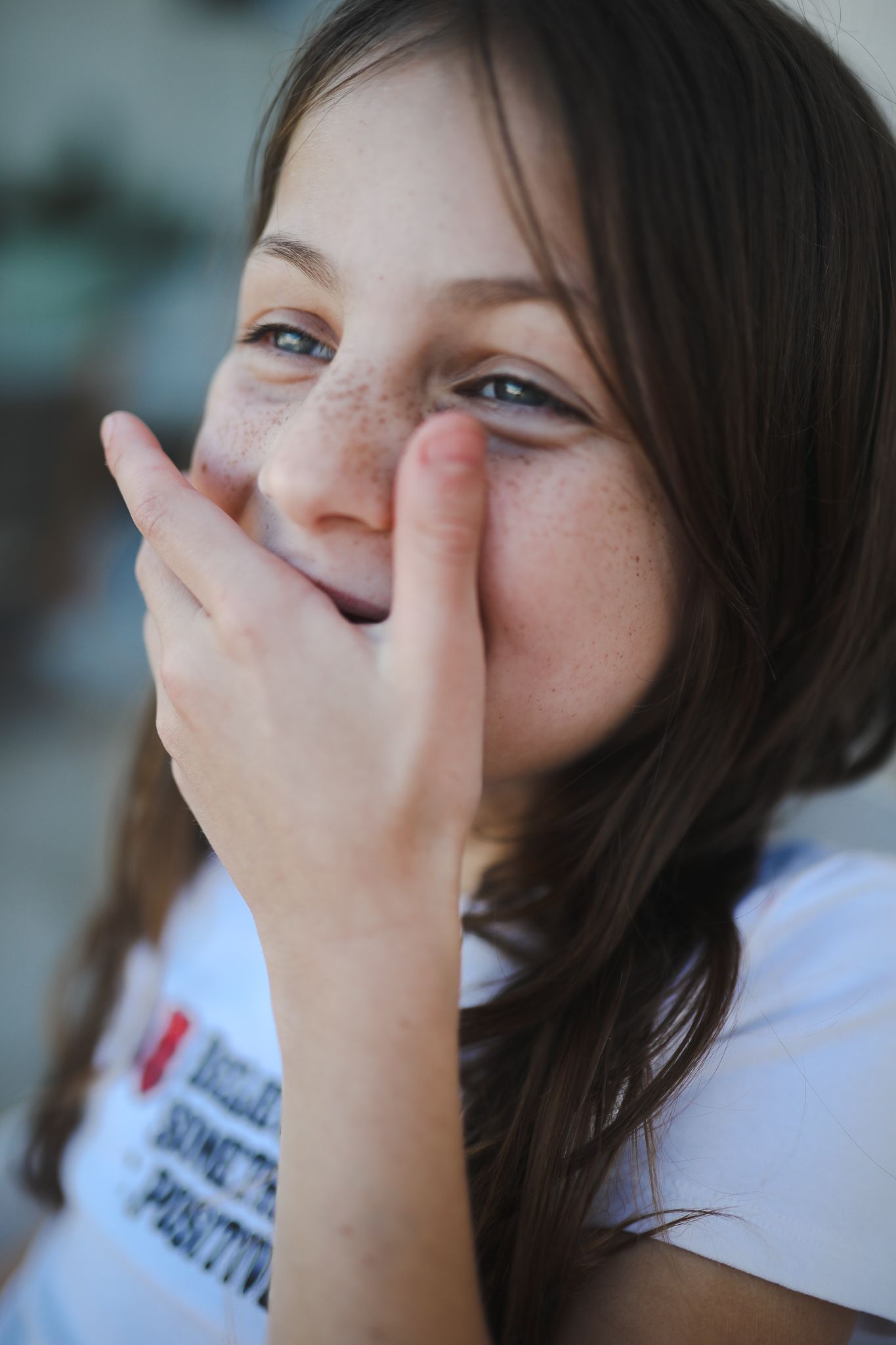Young girl laughing with hand over her mouth, Sydney family photography