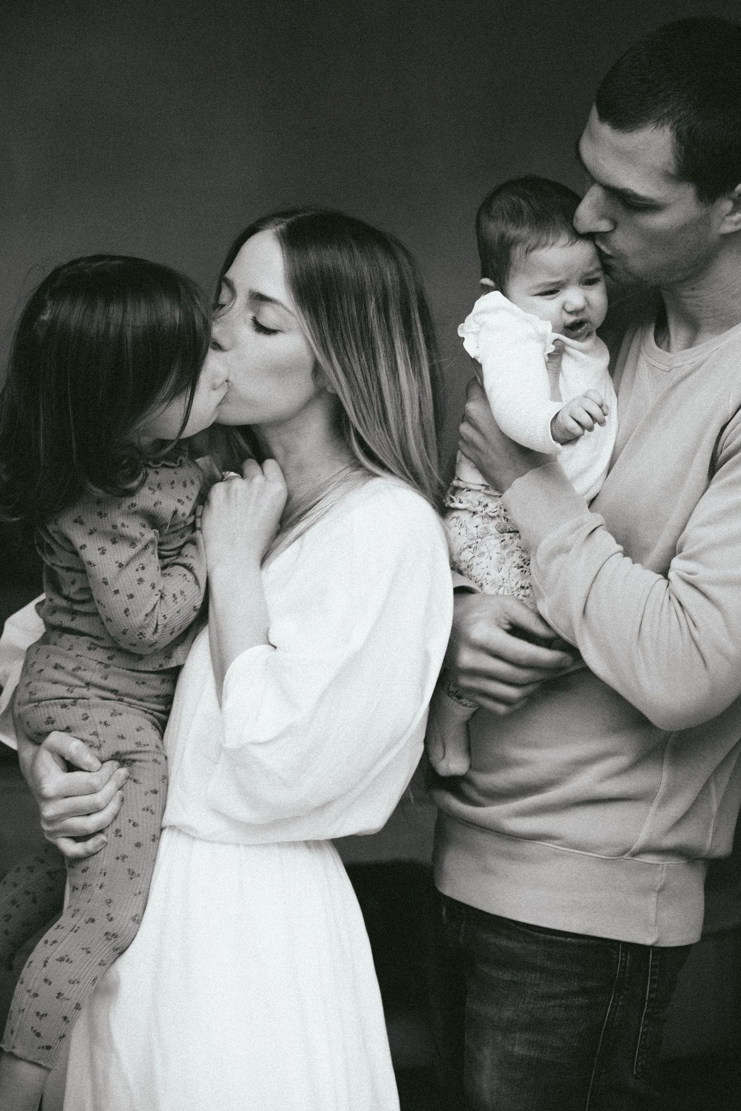 Black and white portrait of parents with toddler and newborn baby, Sydney family and newborn photography