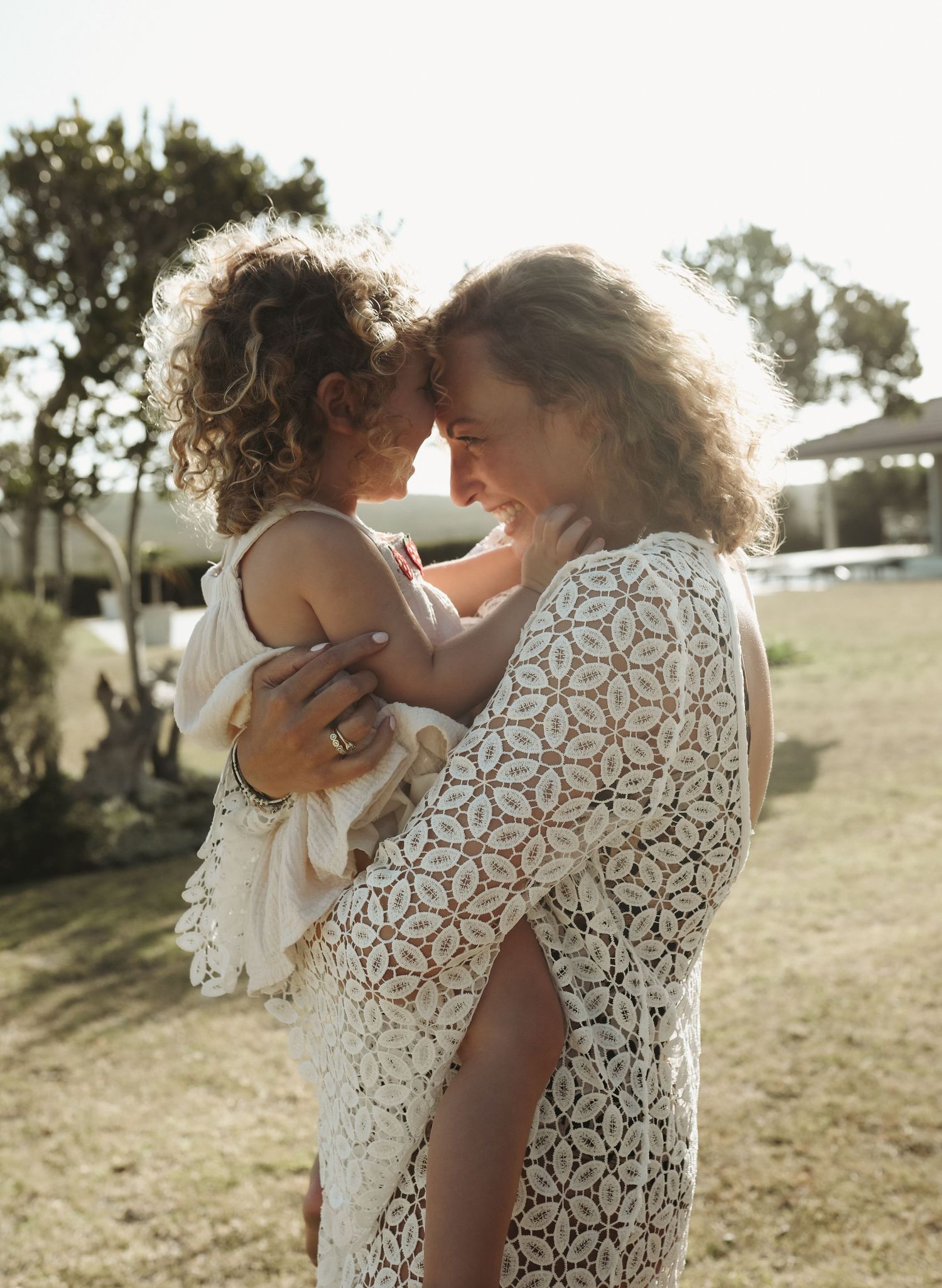 Mother and daughter standing together in garden setting, Sydney family photography