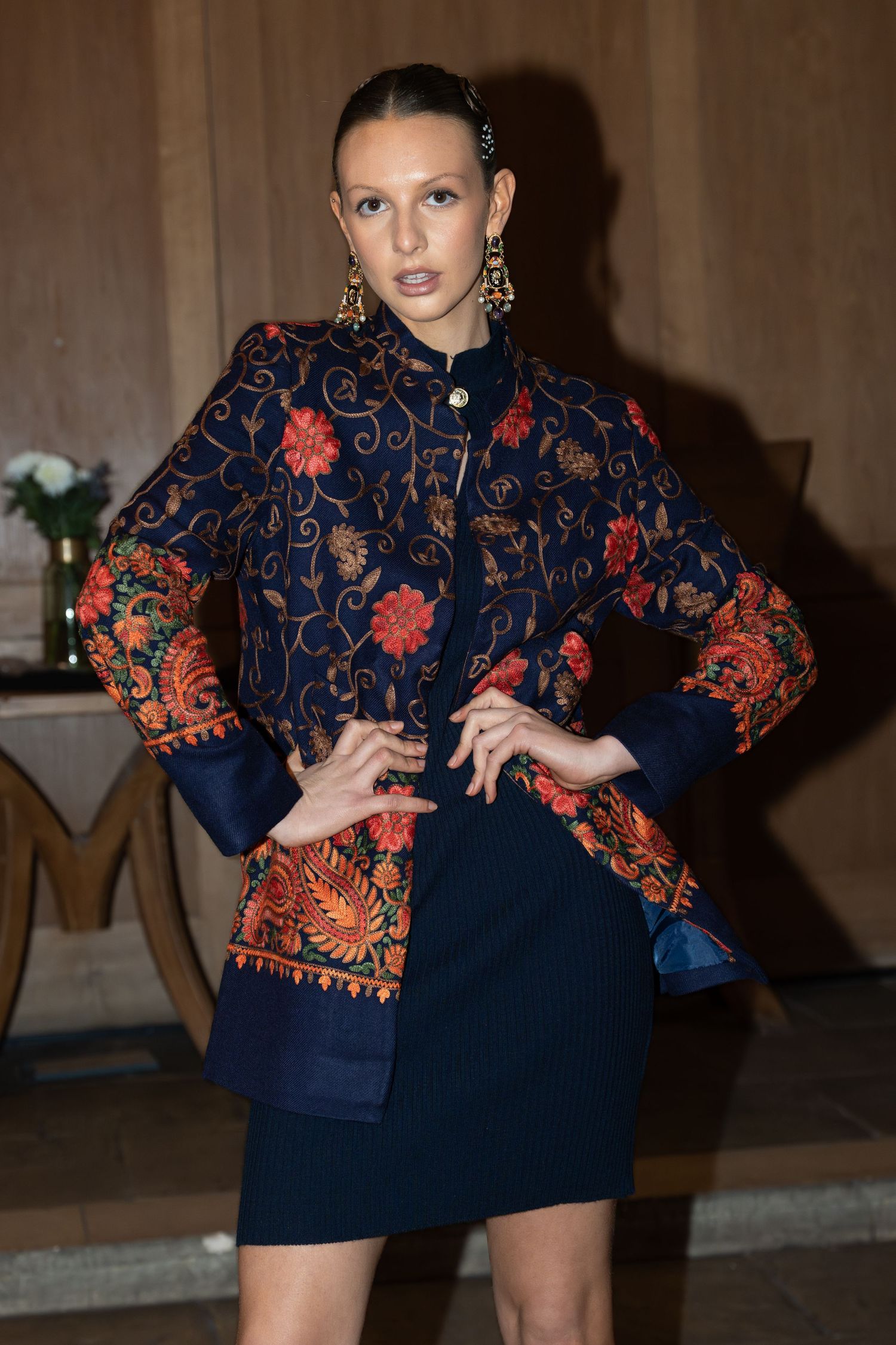 London Fashion Week portrait of a model in an embroidered jacket and statement earrings, by Anya MacLaren Photography