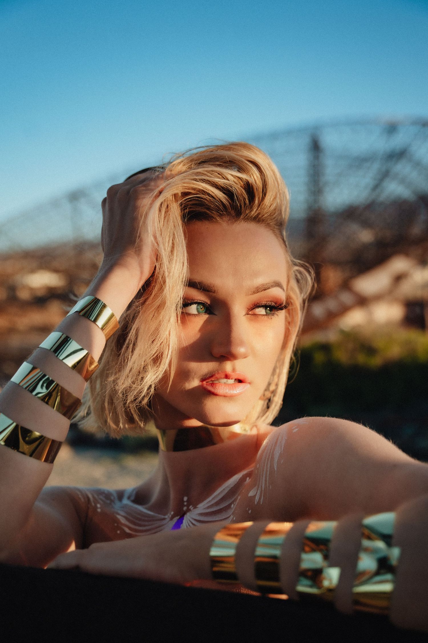 Close-up fashion portrait of a woman shot in golden hour light by London photographer Anya MacLaren