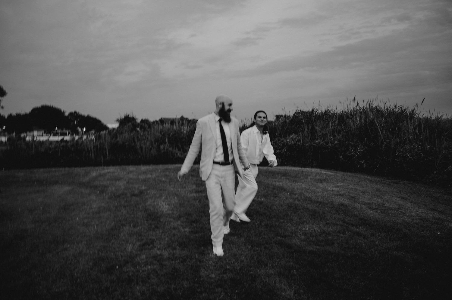 Wedding Photo of Couple Running taken at The Mansion at West Sayville, Long Island